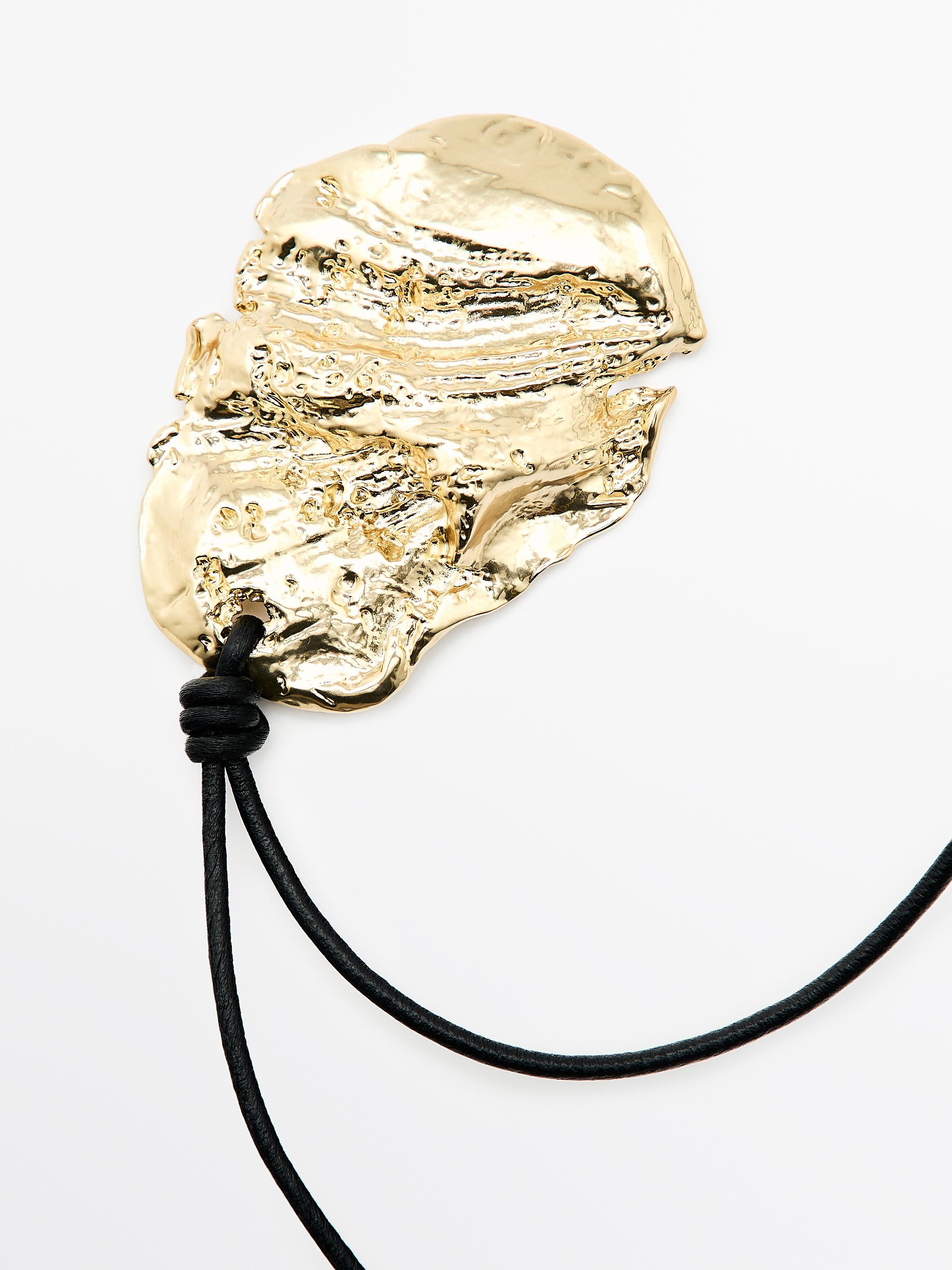 Leather cord necklace with fossil pendant