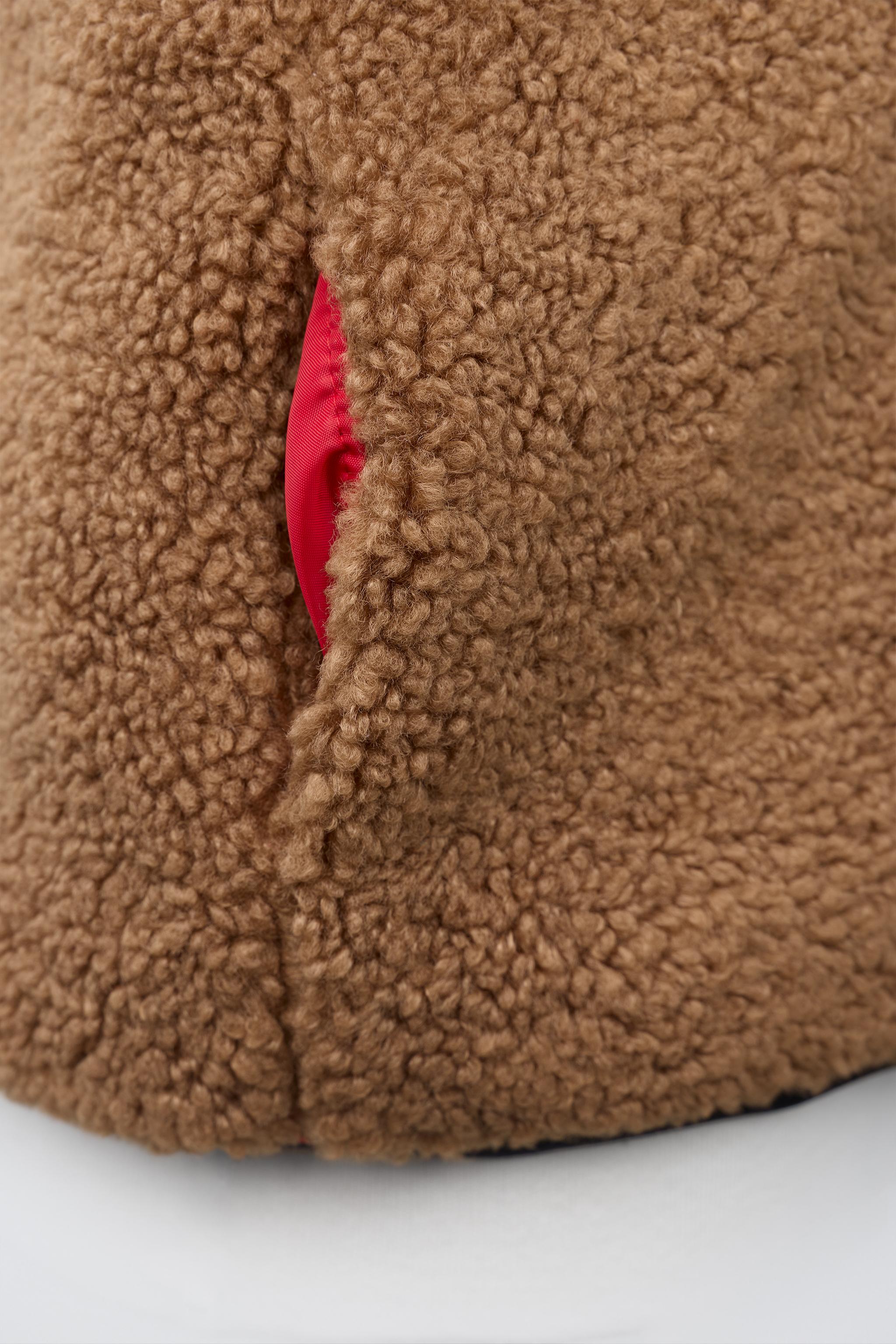 GILET SANS MANCHES RÉVERSIBLE EFFET MOUTON