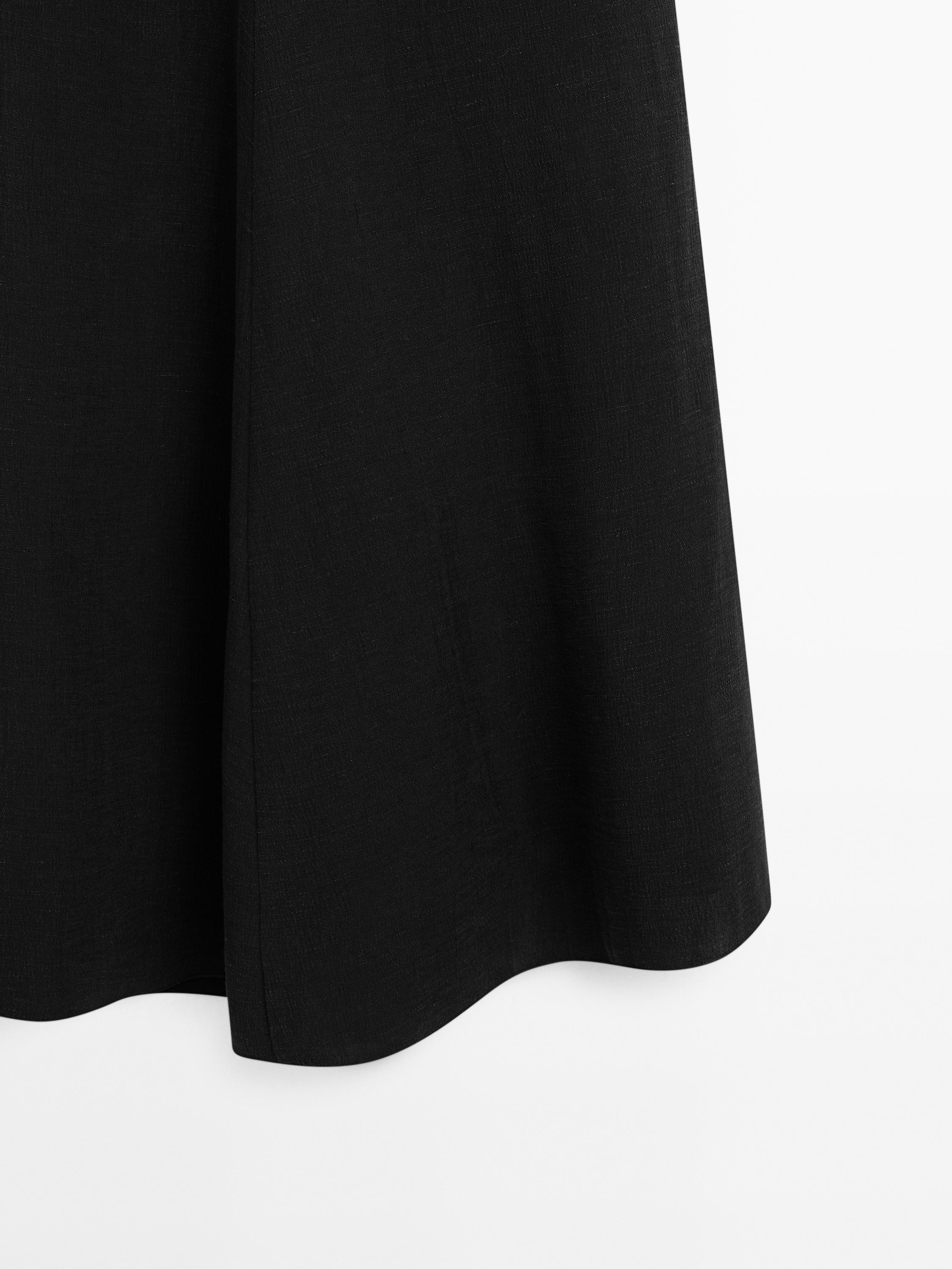 Halter midi dress with low-cut back