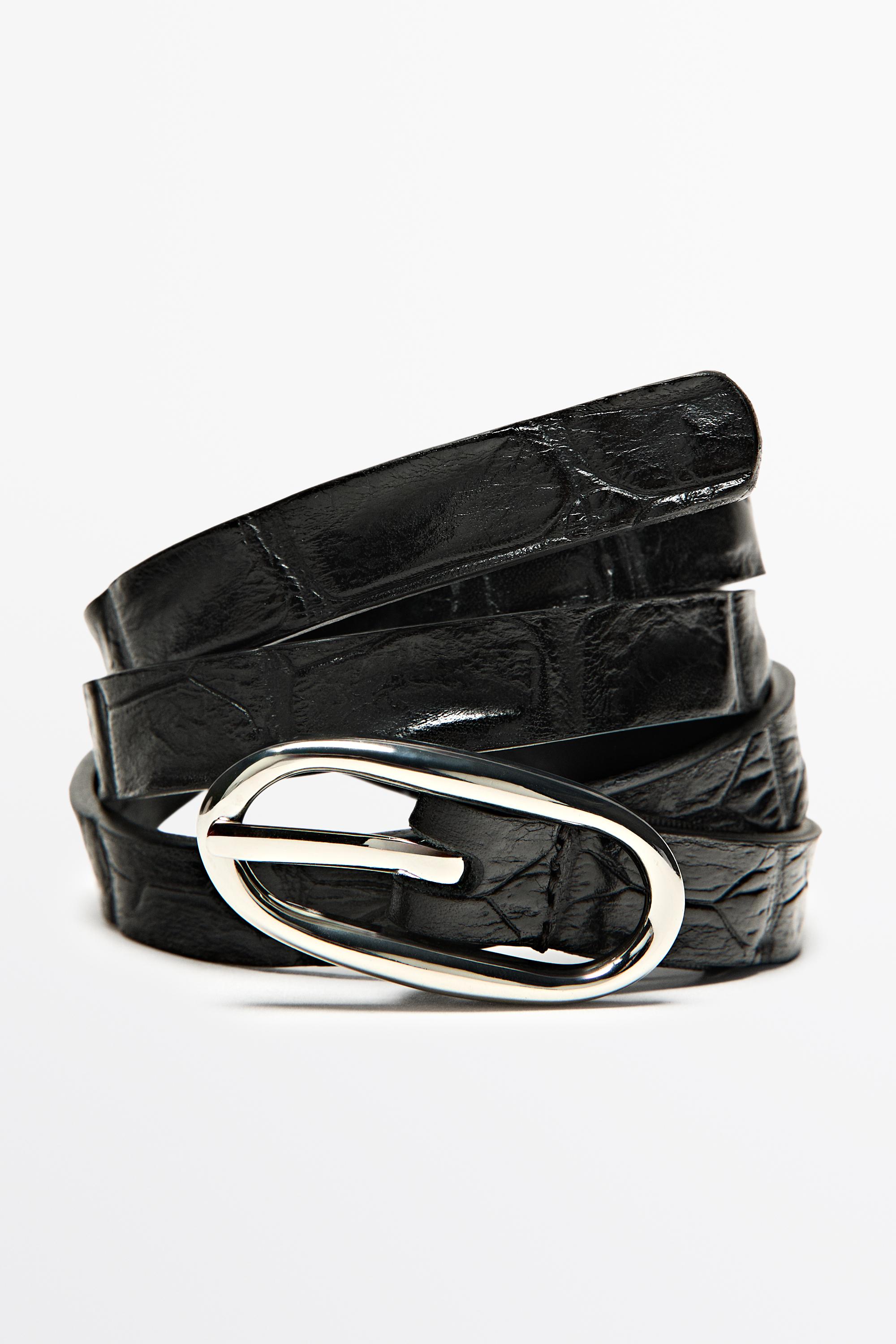 Leather belt with oval buckle and textured finish