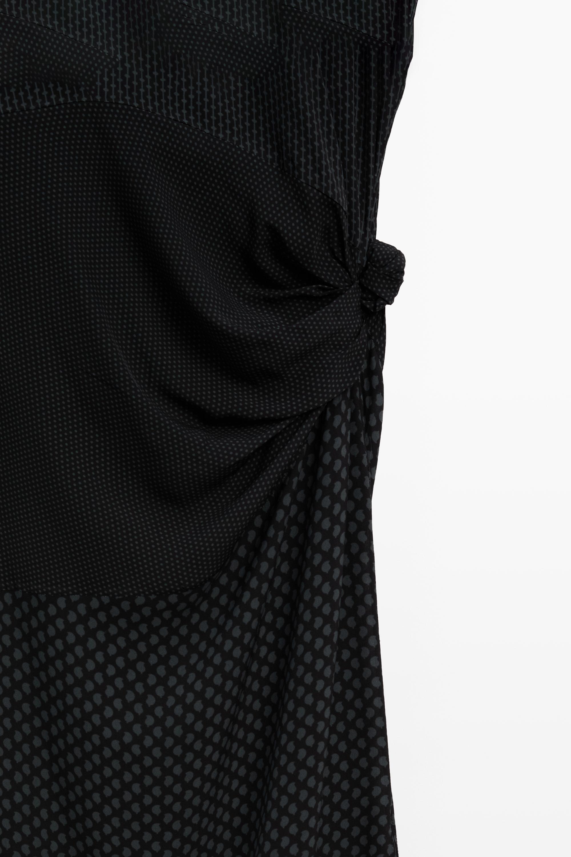 Long flowing printed dress with knot detail
