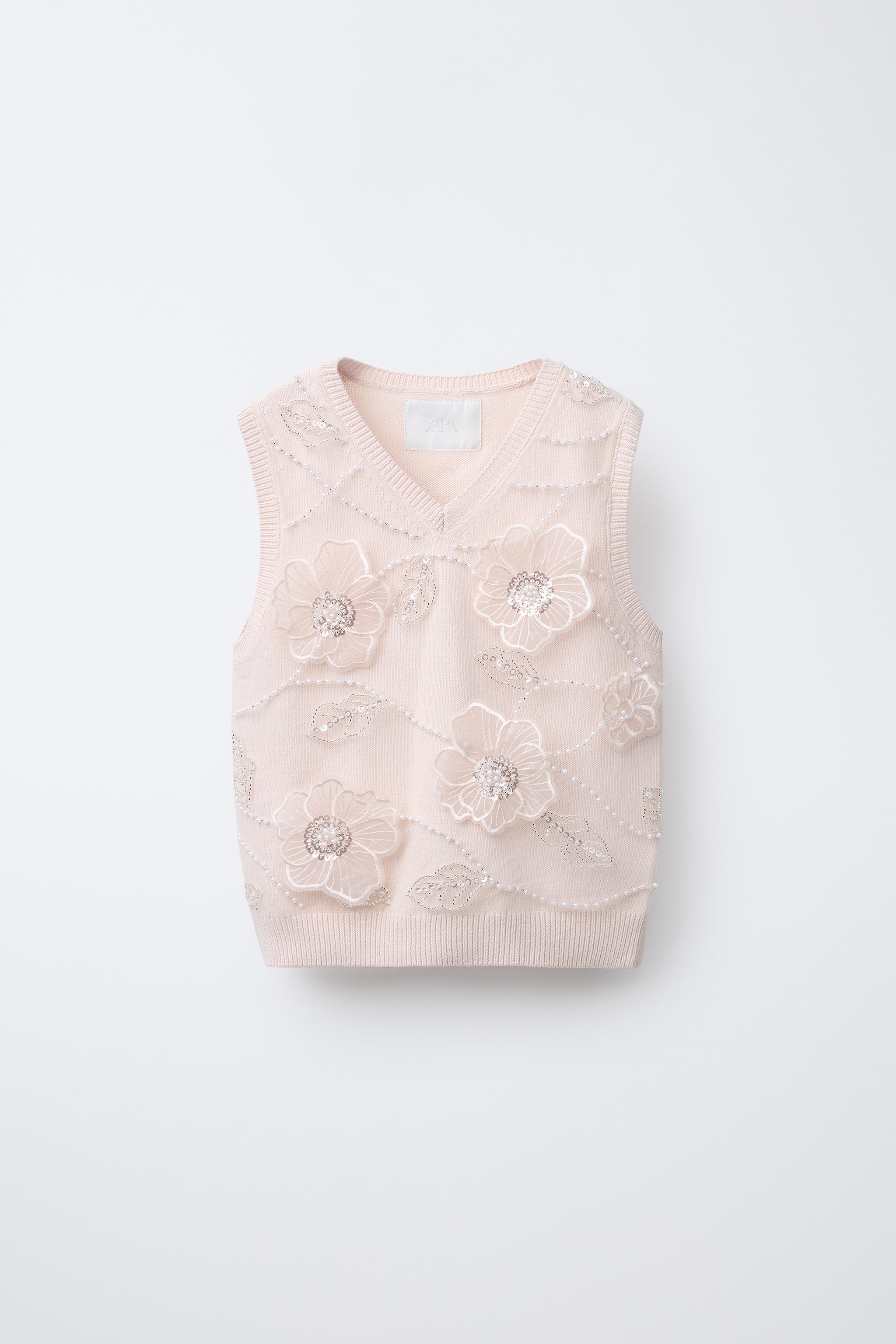 GILET EN MAILLE FLEURS BRILLANTS