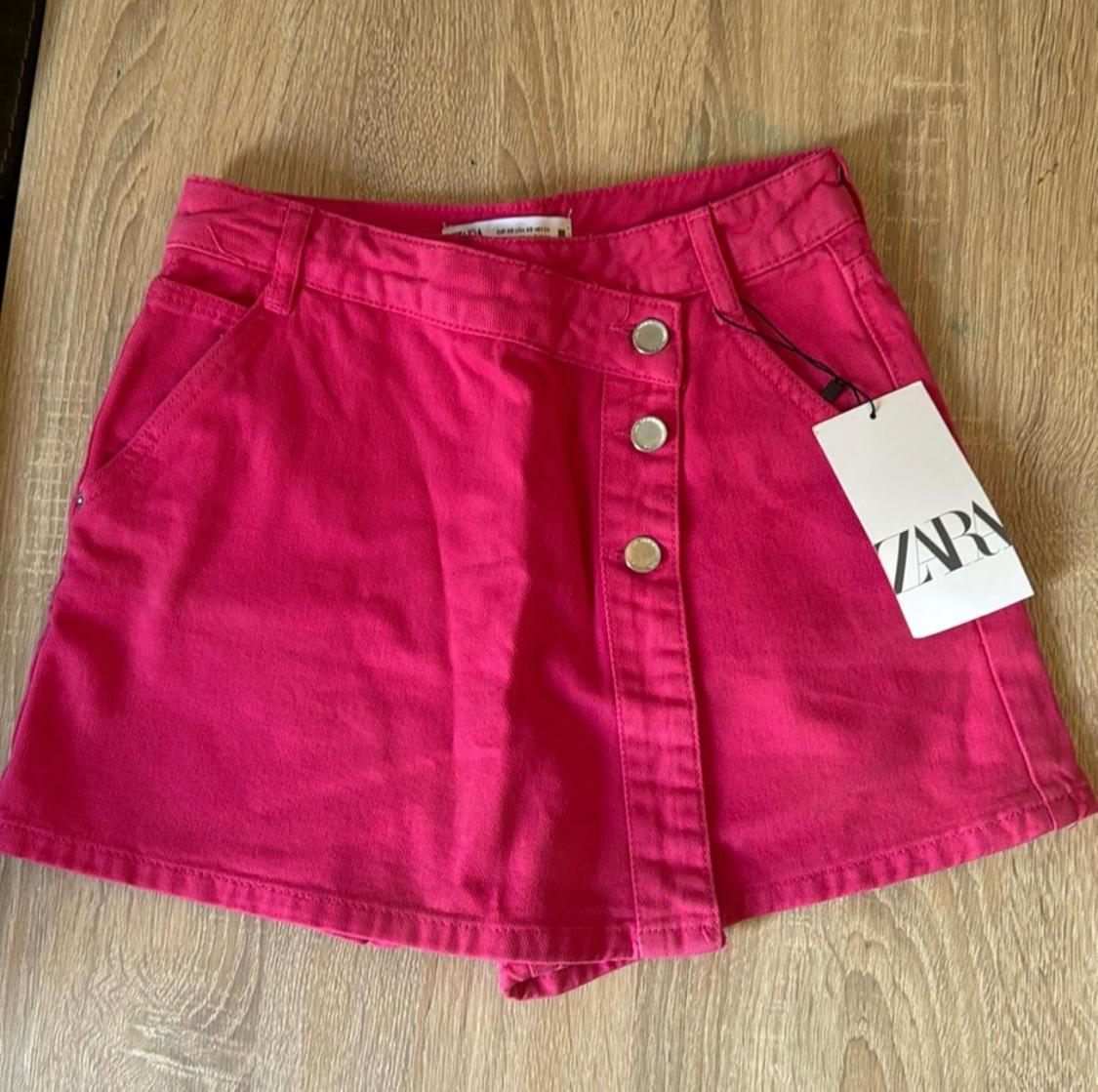 SPLIT SKIRT WITH BUTTONS