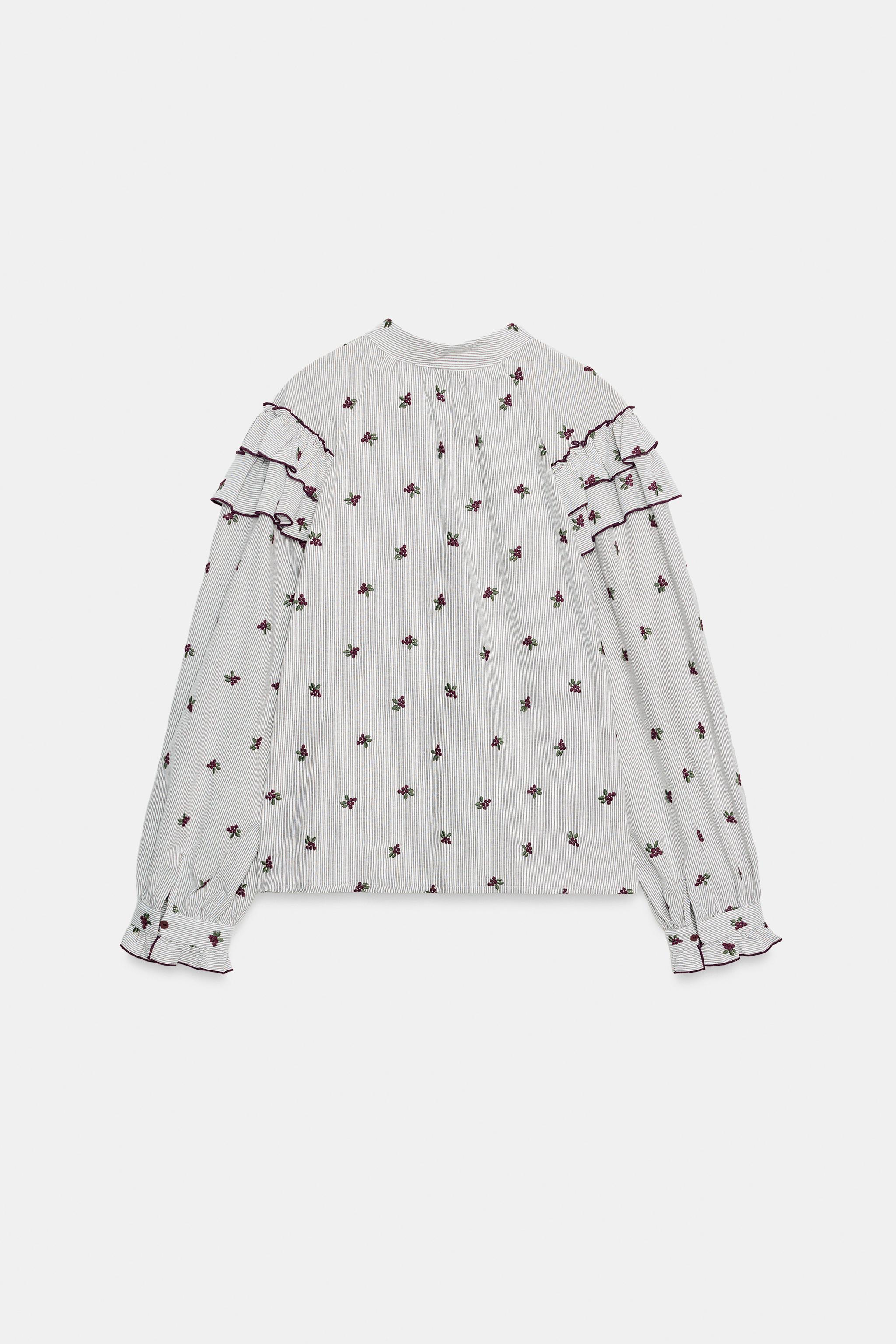 EMBROIDERED RUFFLE BLOUSE