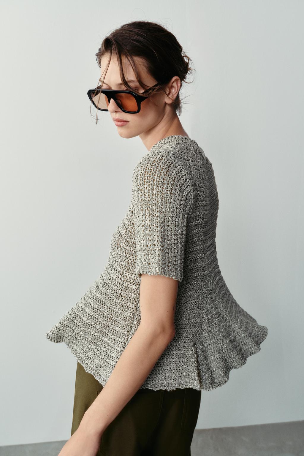 CUTWORK PEPLUM KNIT TOP