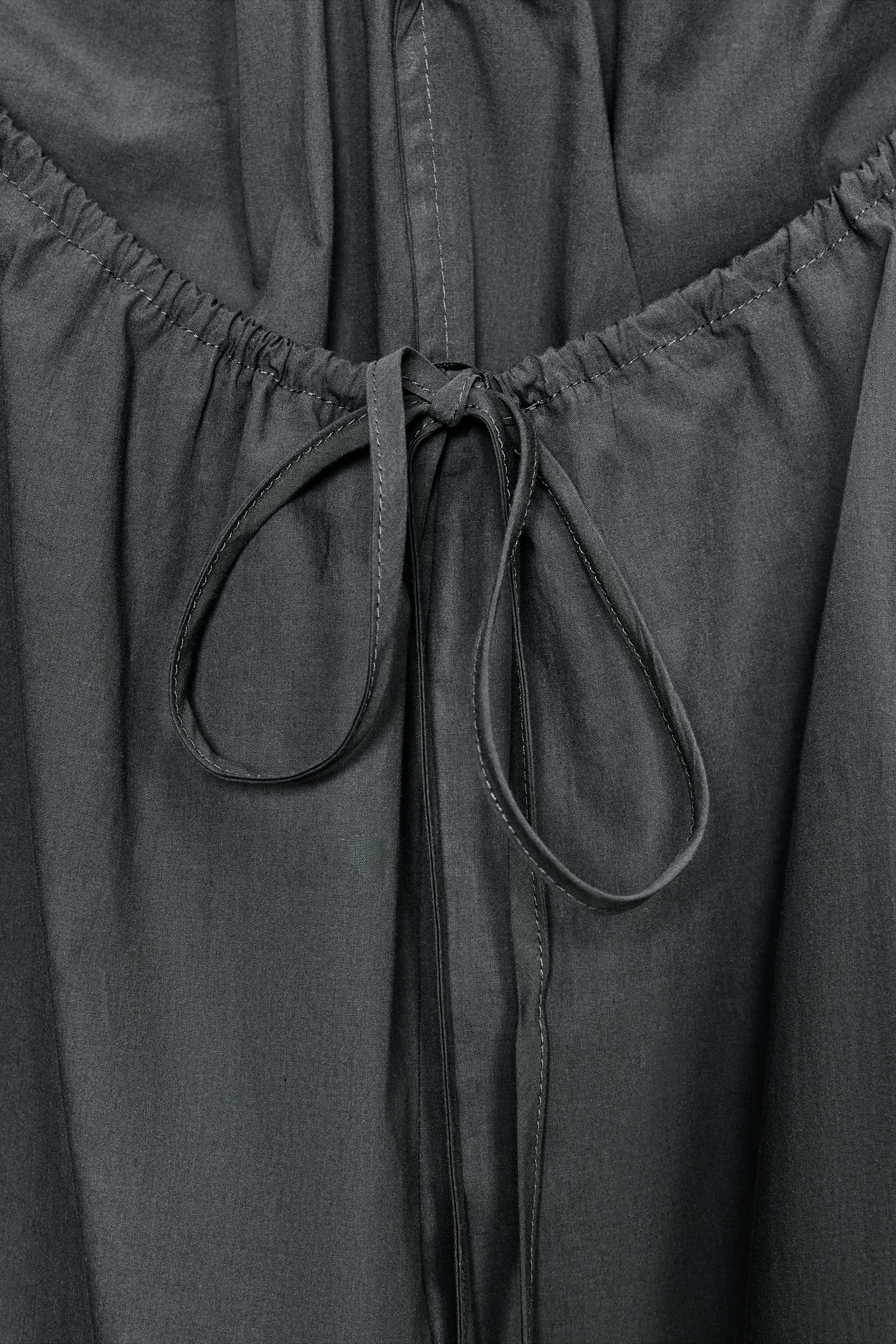 ROBE MINI HALTER PLIS