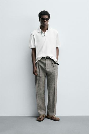 POLO PIQUÉ LAVADO AARON LEVINE X ZARA - Crudo de Zara