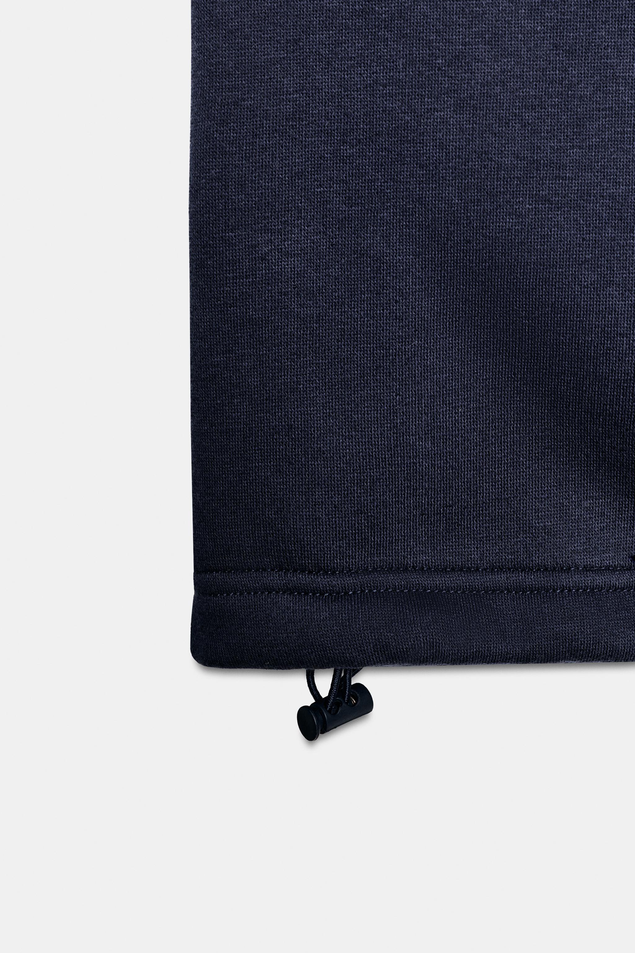 PANTALON EN MOLLETON BASIQUE DROIT À BAS AJUSTABLE