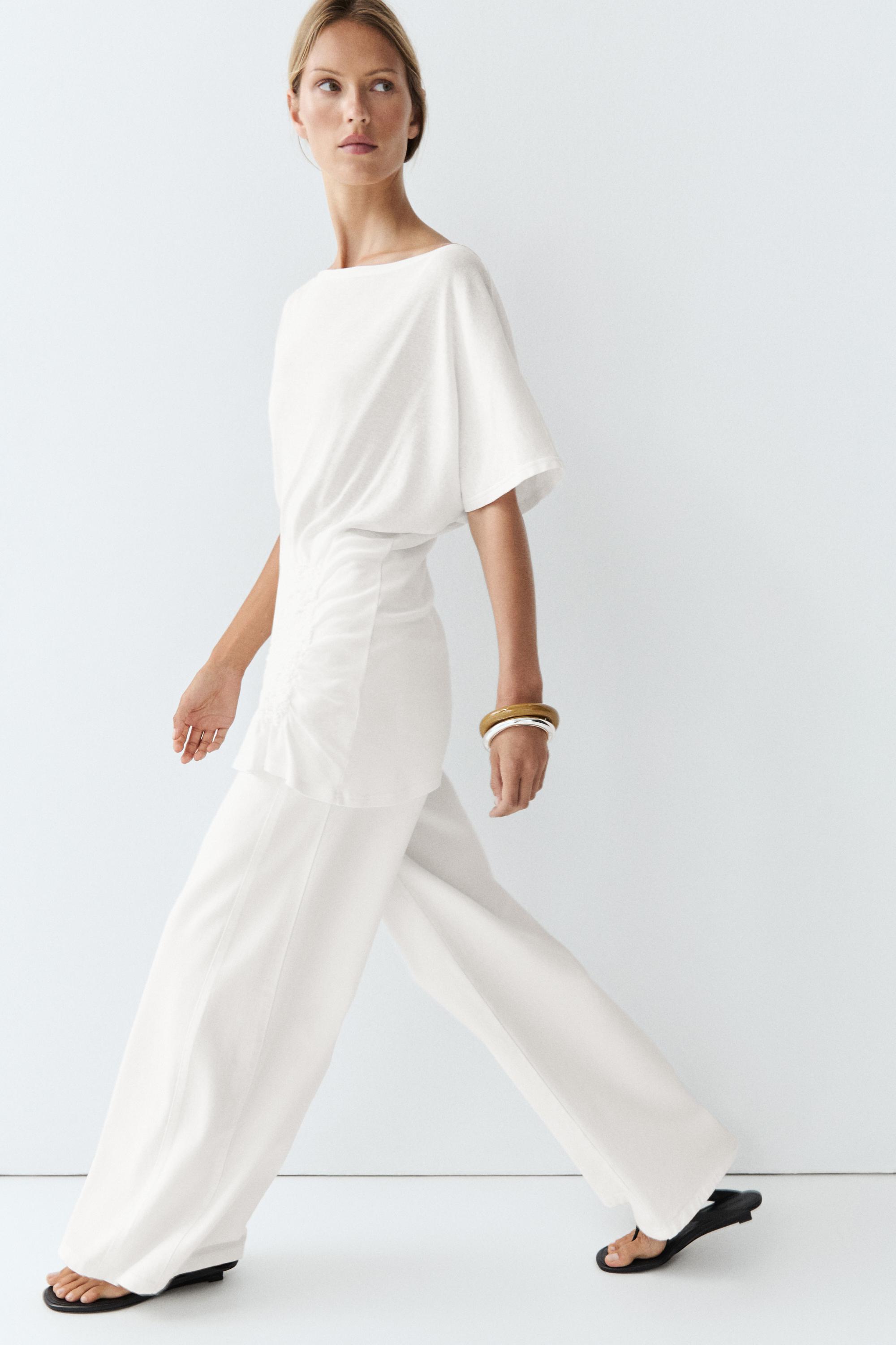Asymmetric top with embroidered detail