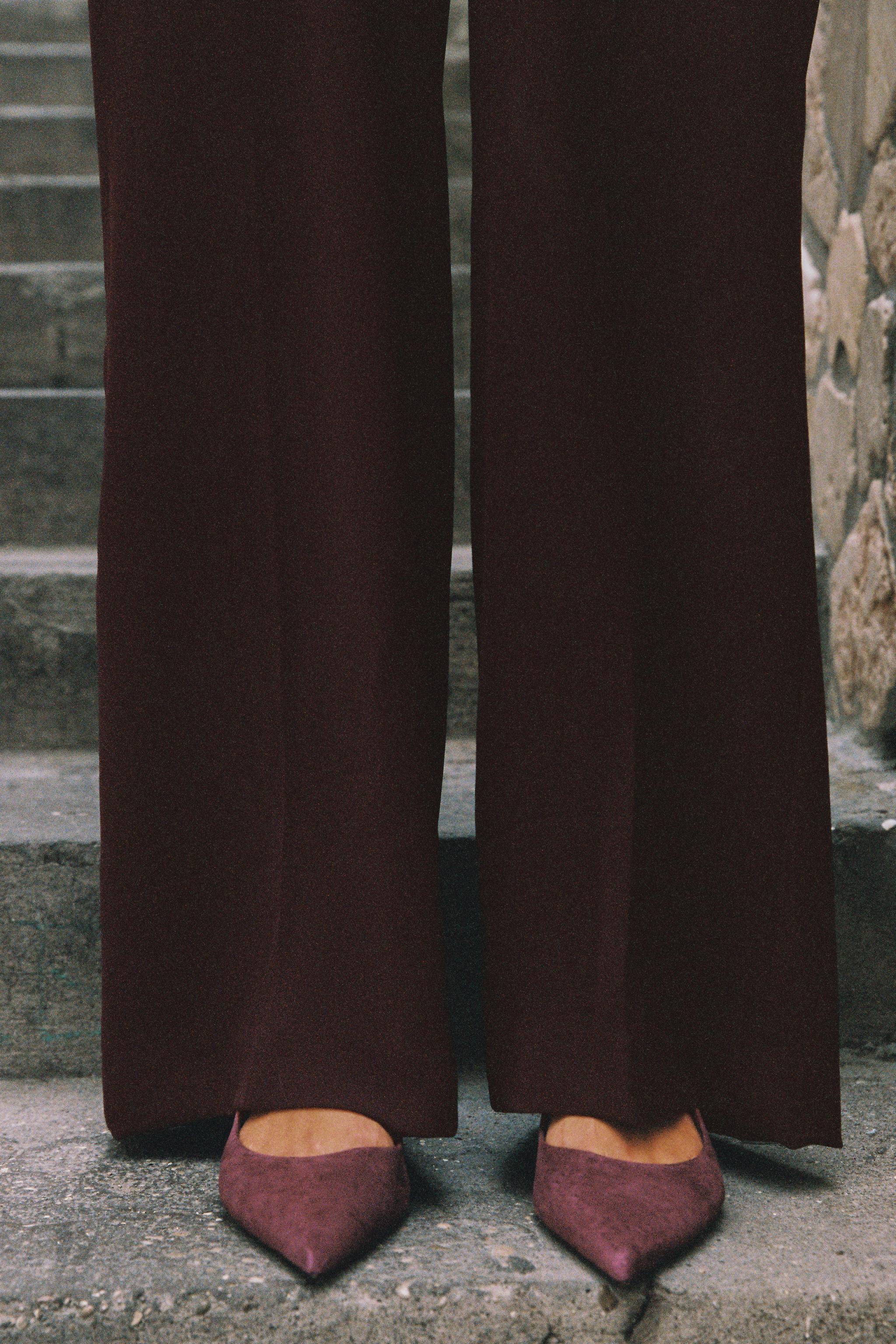 CAPE SLEEVE BELTED JUMPSUIT