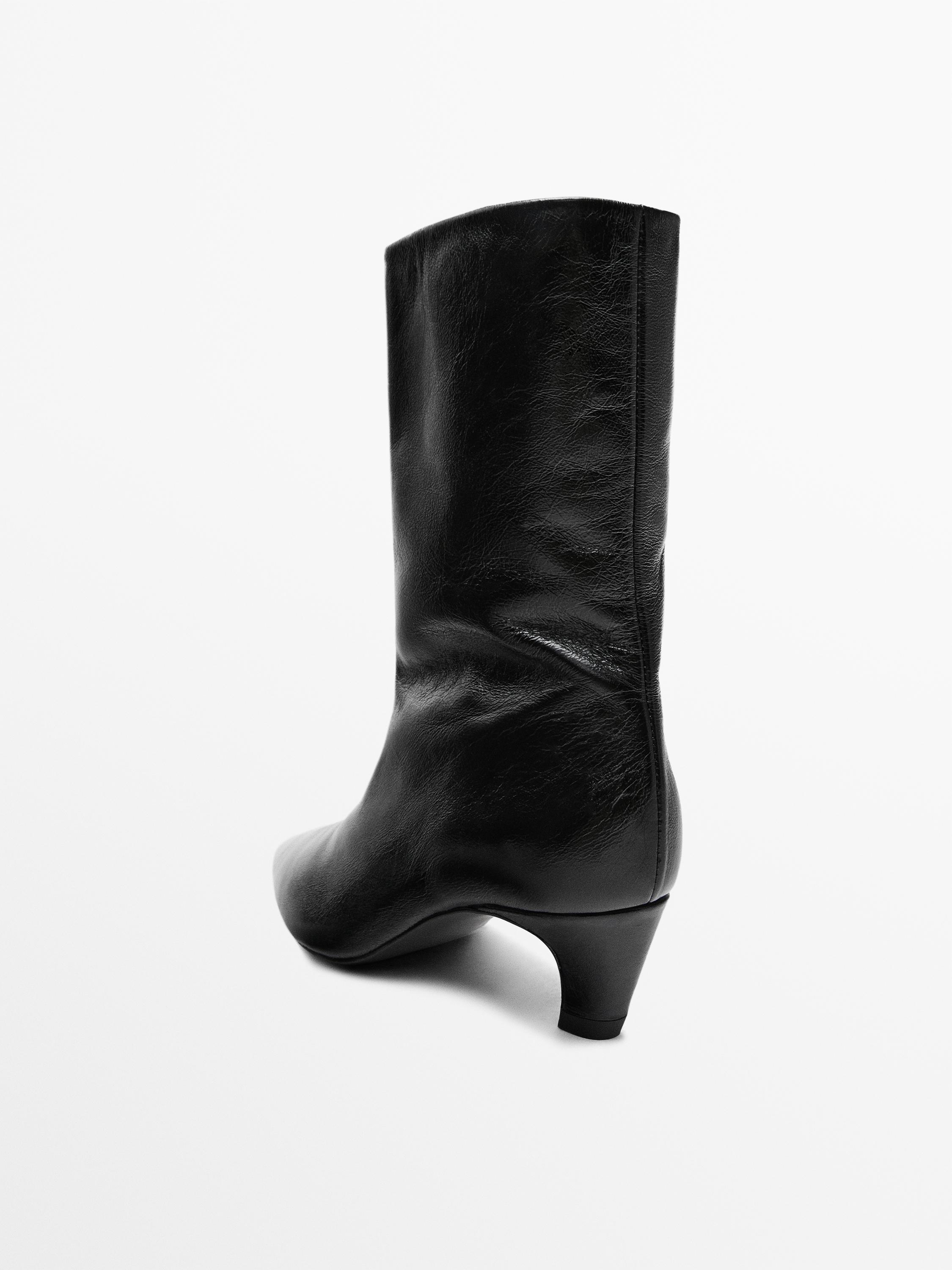 Leather high heel ankle boots