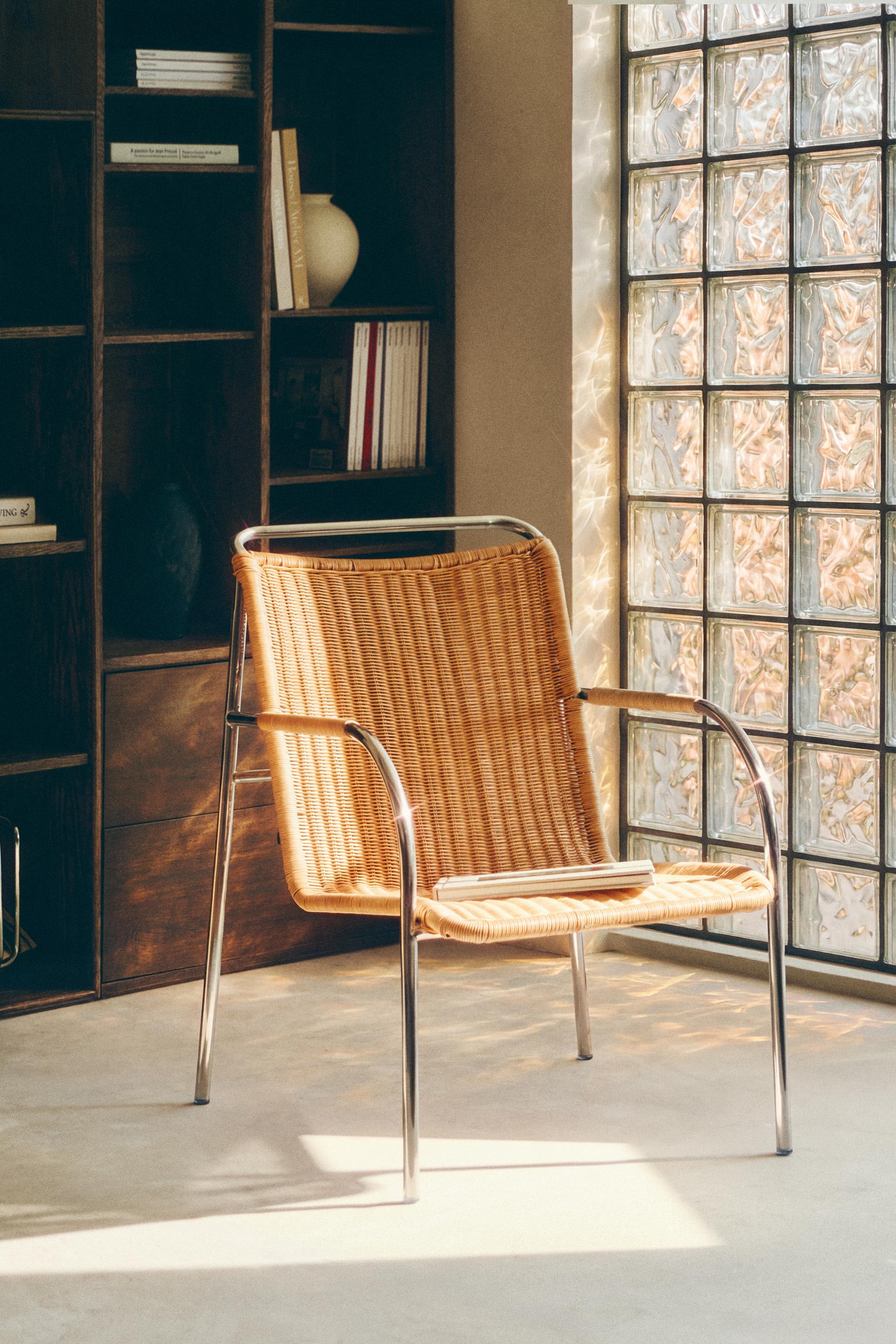 RATTAN AND STEEL ACCENT CHAIR