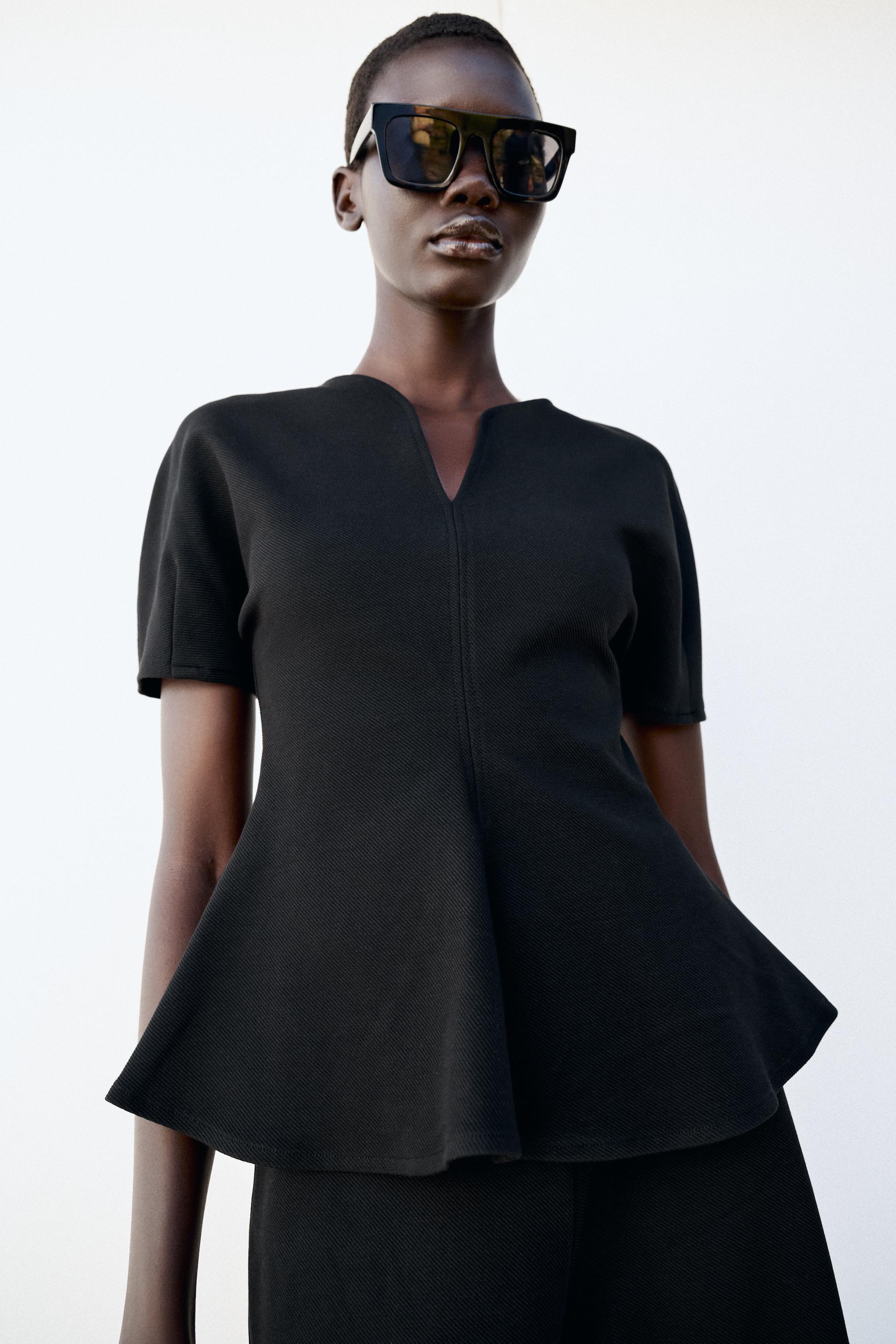 PUFF SLEEVE PEPLUM TOP — Black
