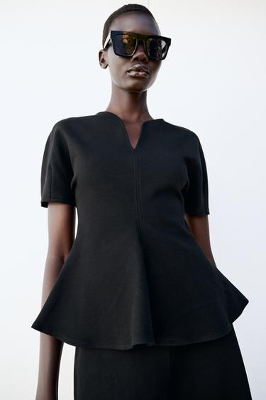 TOP PEPLUM CON MANICHE A SBUFFO - Nero di Zara