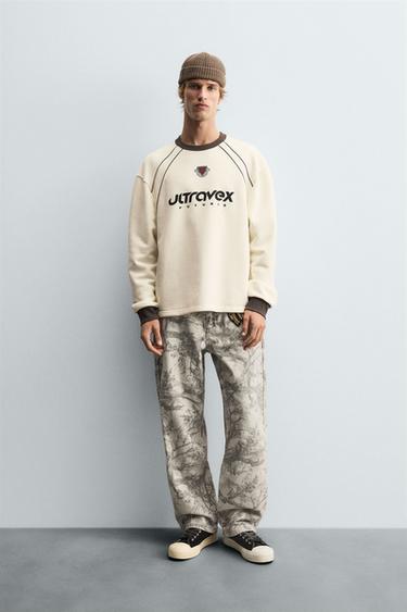 SUDADERA TEXTO ESTAMPADO - Blanco roto de Zara - Imagen 0