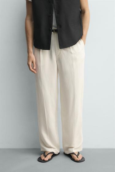 RELAXED FIT PLEATED CHINO TROUSERS - Ecru by Zara