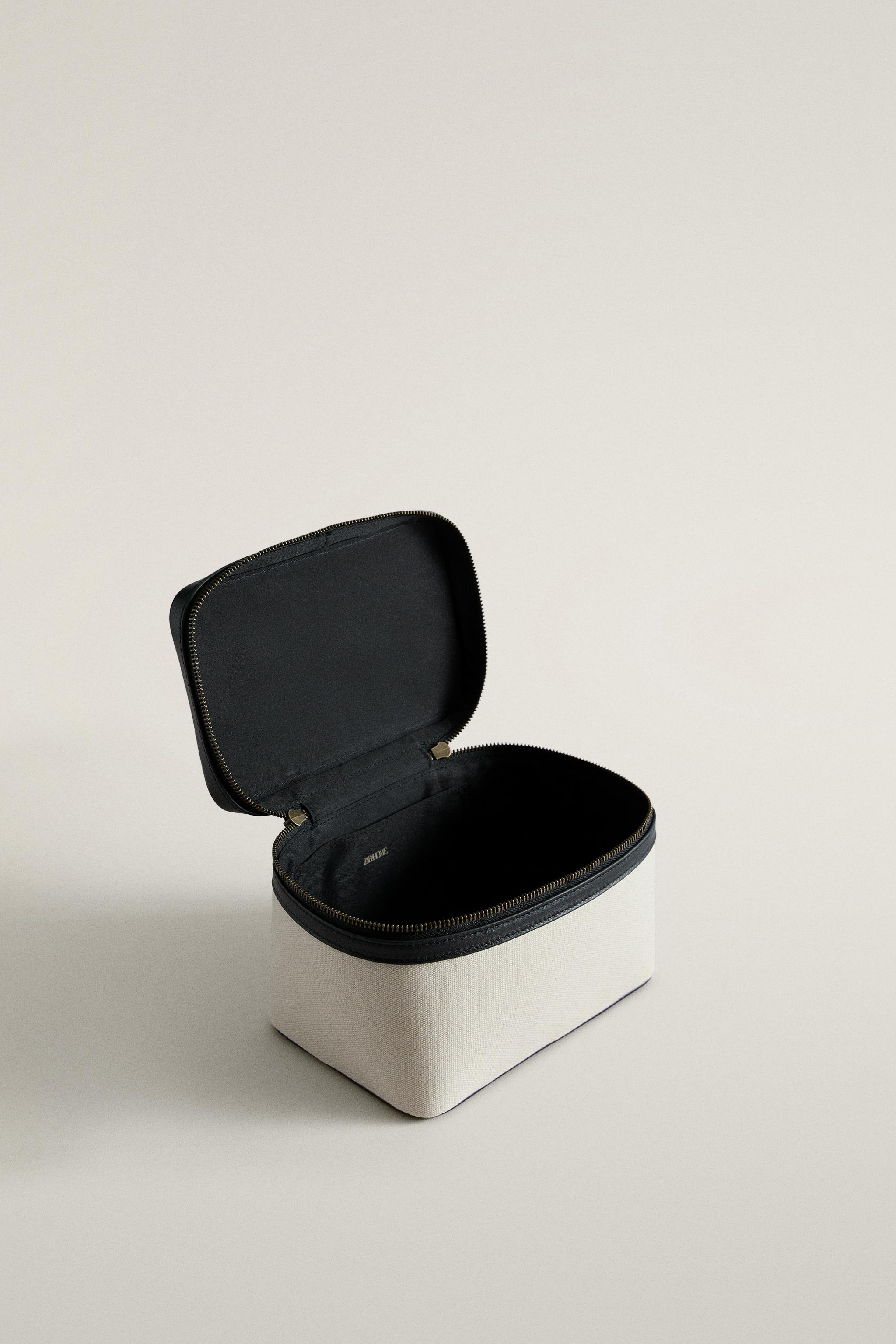 RIGID CANVAS AND LEATHER MAKEUP BAG