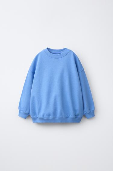 سويت شيرت أوفرلوك سادة - أزرق فاقع الخاص بـ Zara