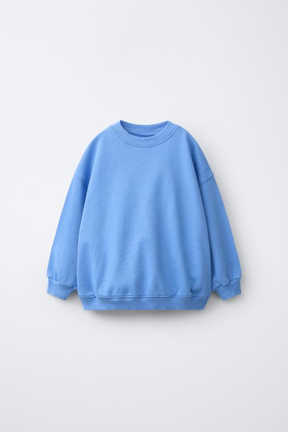 SUDADERA OVERLOCK LISA - Azulón de Zara - Imagen 0