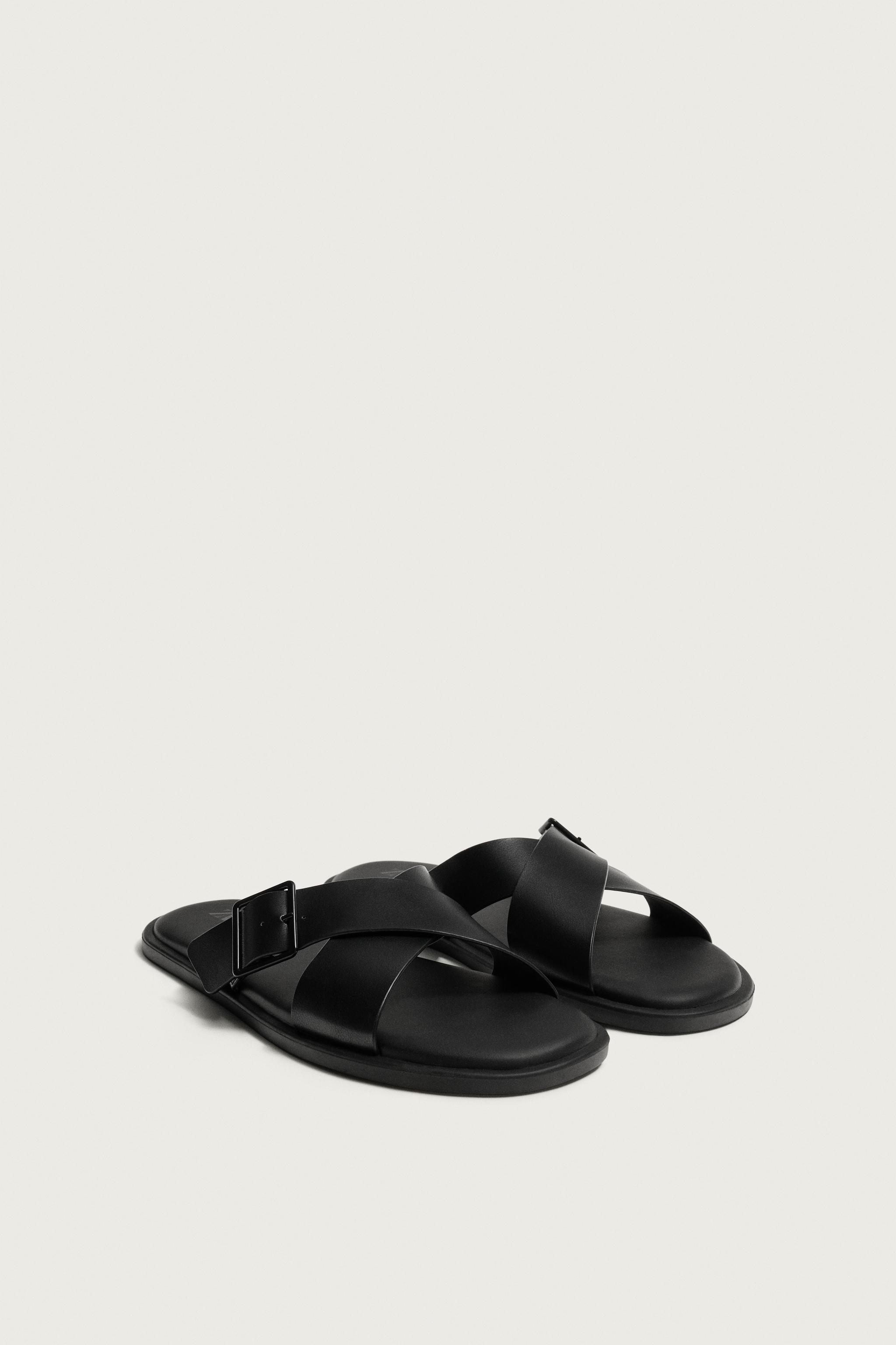 BUCKLED CRISSCROSS SANDALS — Black