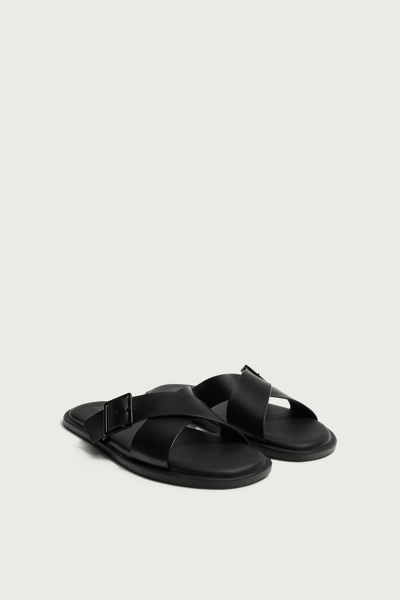 BUCKLED CRISSCROSS SANDALS — Black