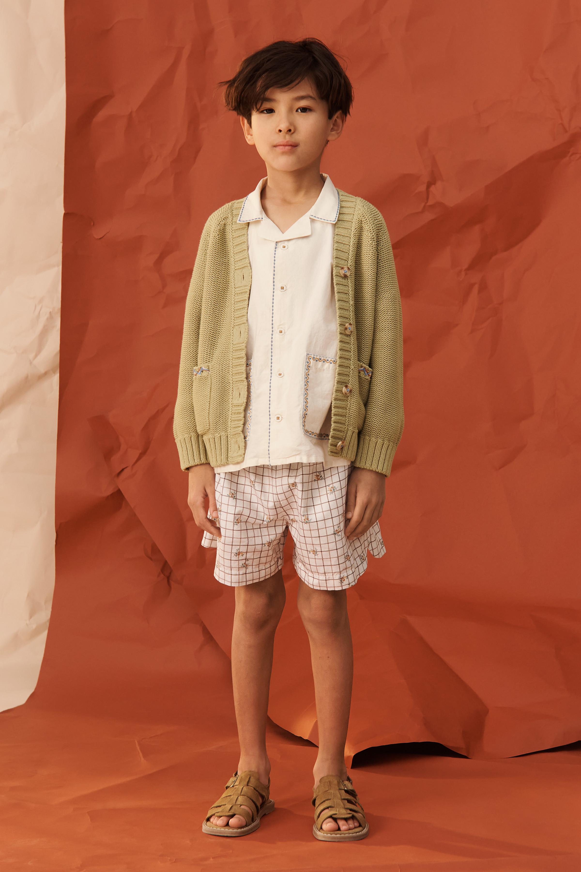GILET EN MAILLE SURPIQÛRES BRODÉES ÉDITION LIMITÉE