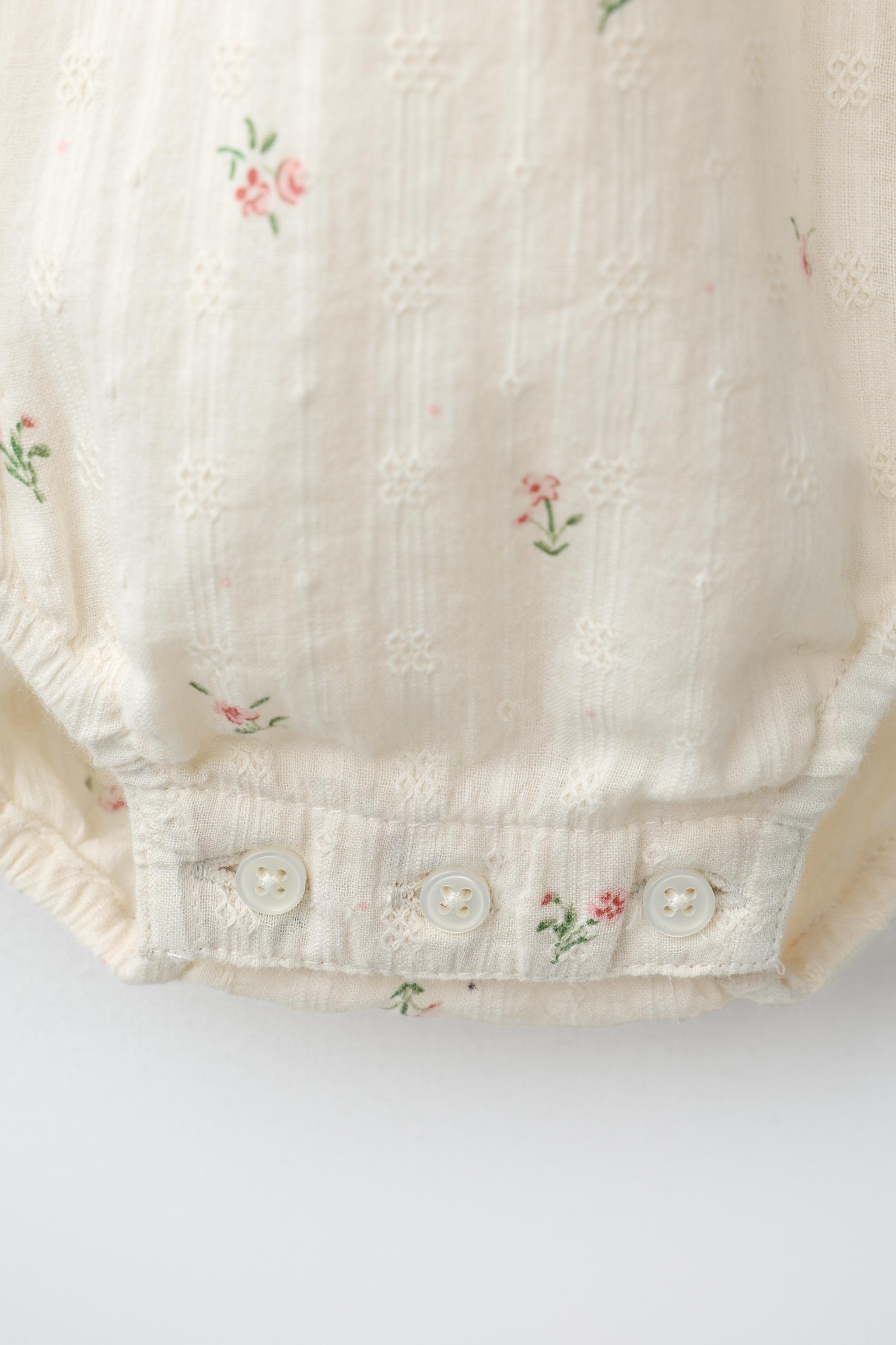 EMBROIDERED FLORAL BODYSUIT