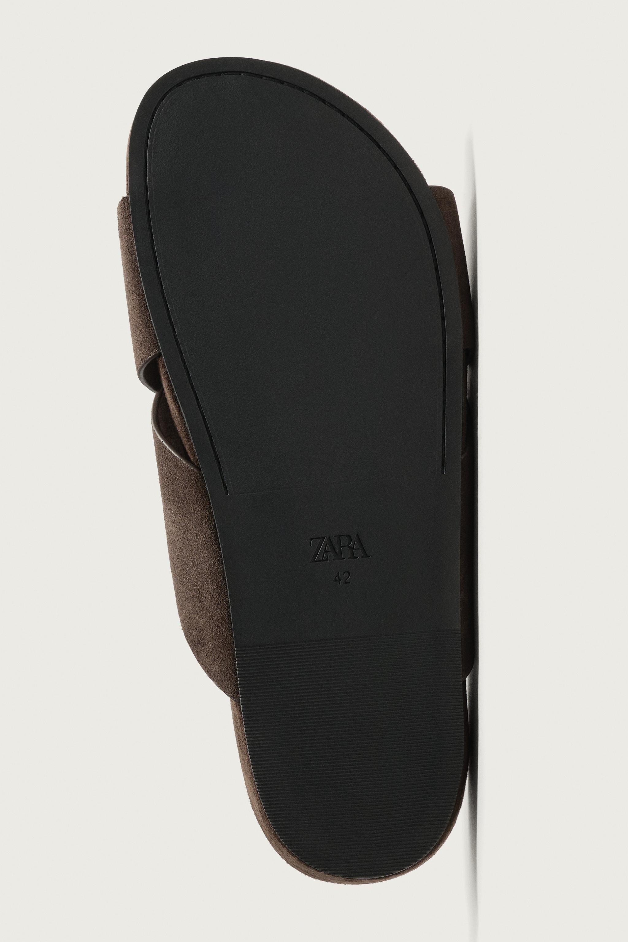 LEATHER CROSSOVER SANDALS