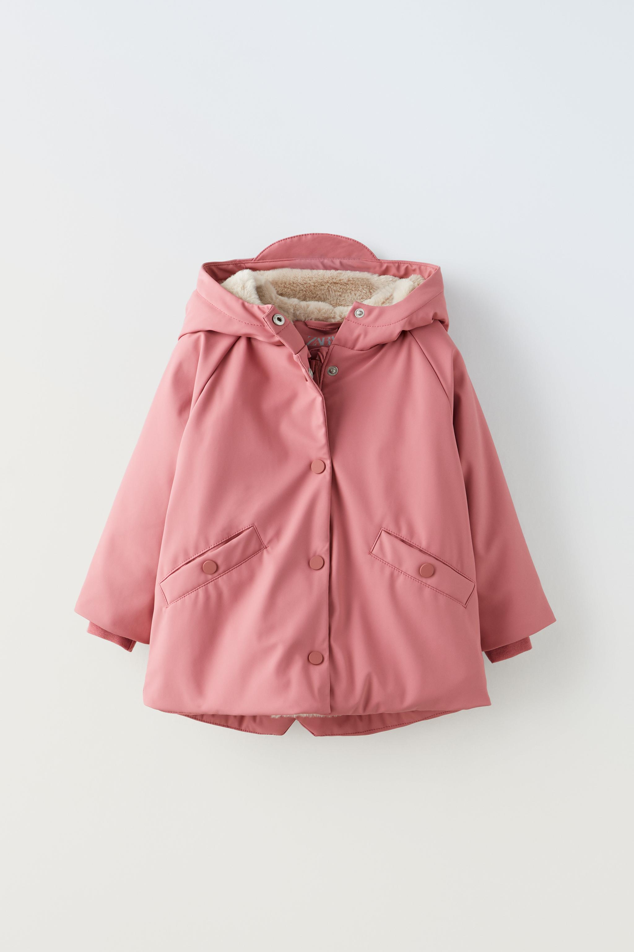 Pink raincoat store with hood