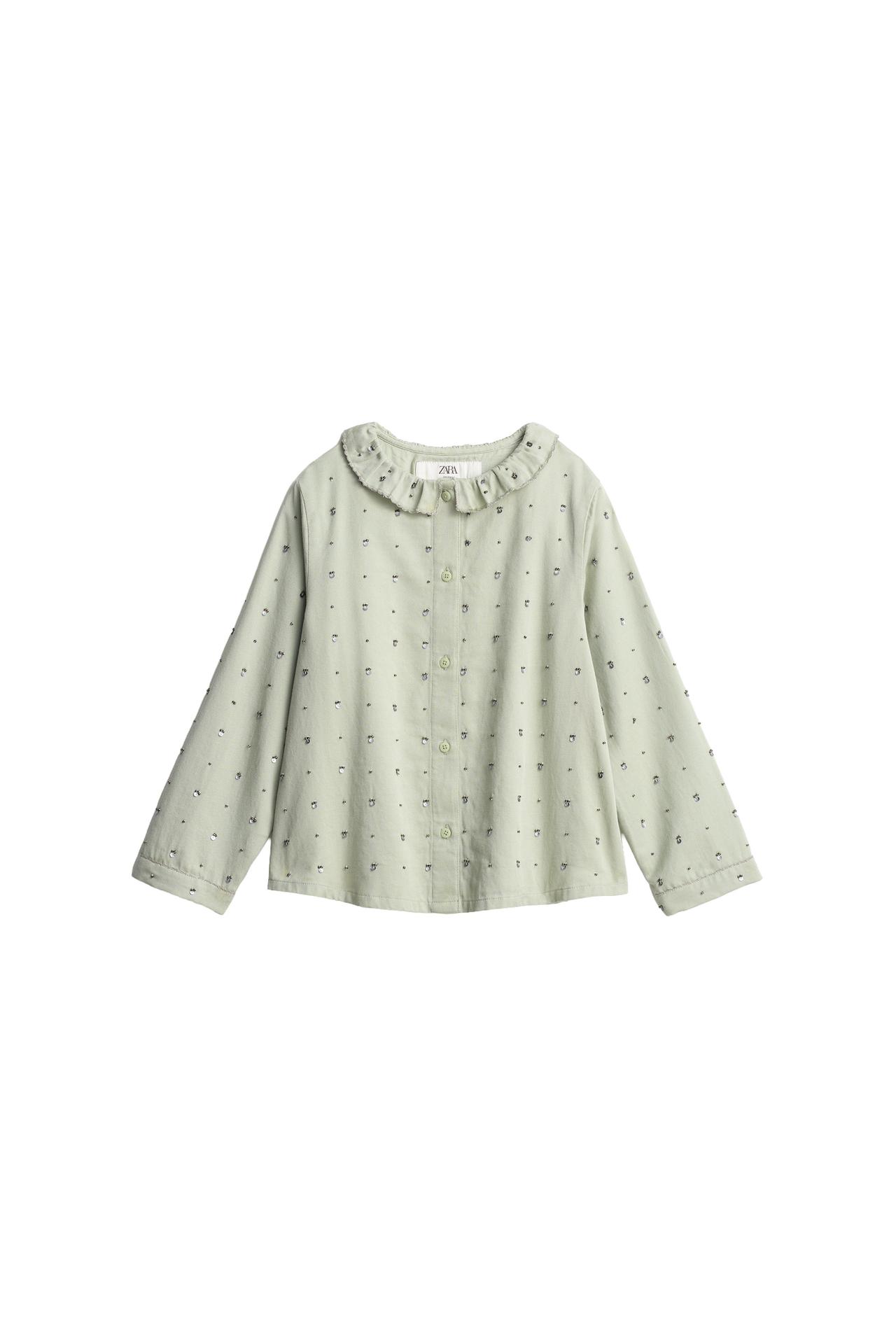 LIMITED EDITION SEQUIN RUFFLE NECK BLOUSE