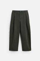 RELAXED FIT PLEATED PANTS