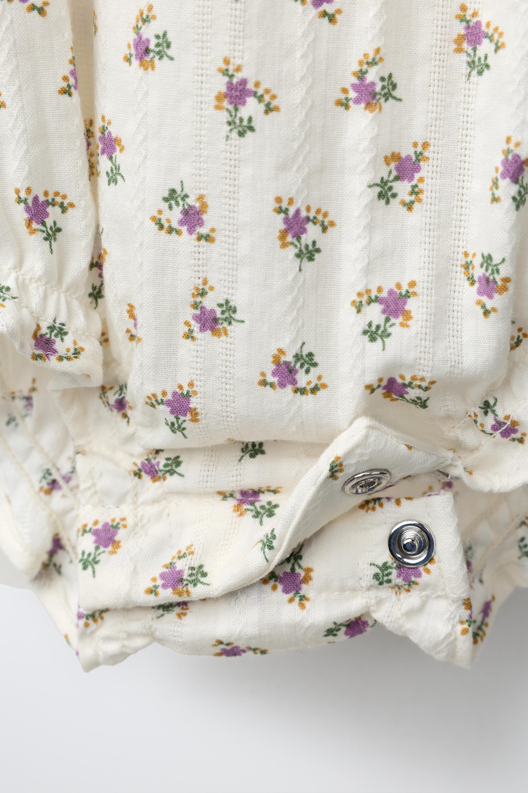 FLORAL PRINT BODYSUIT