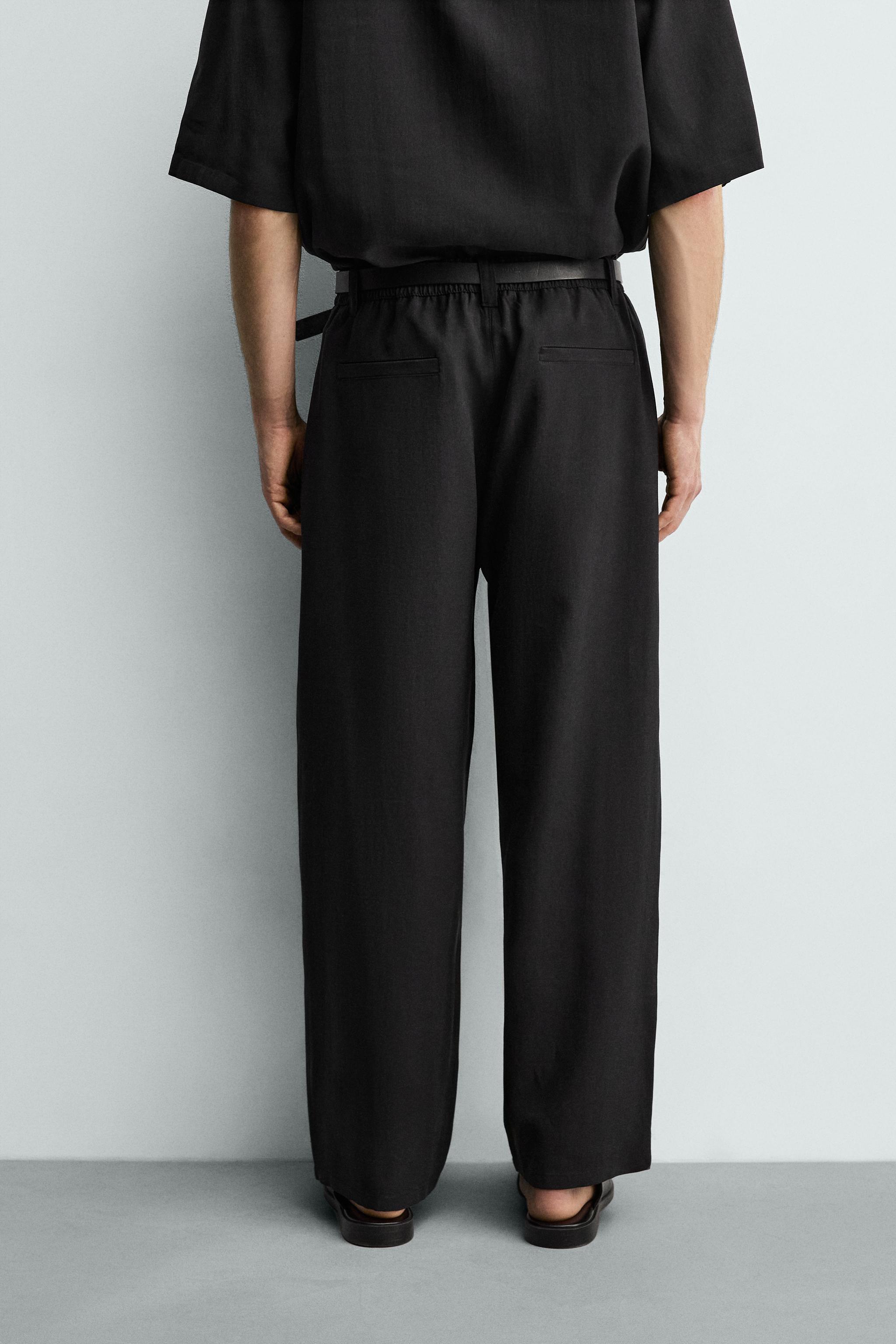 FLOWY PLEATED PANTS