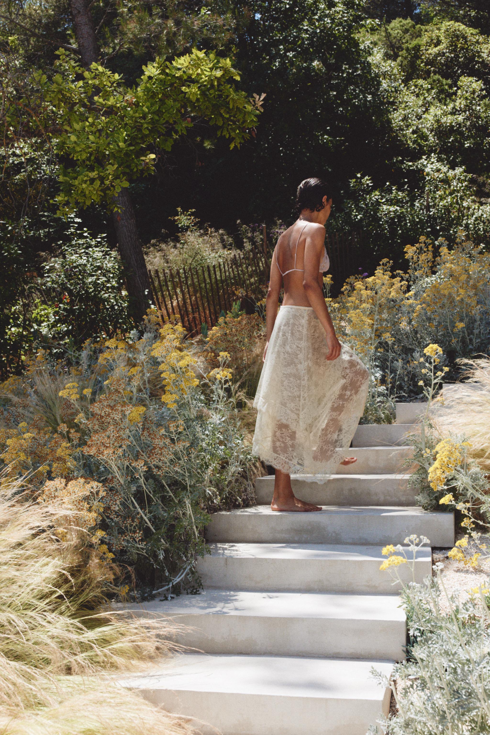 ASYMMETRIC LACE MIDI SKIRT