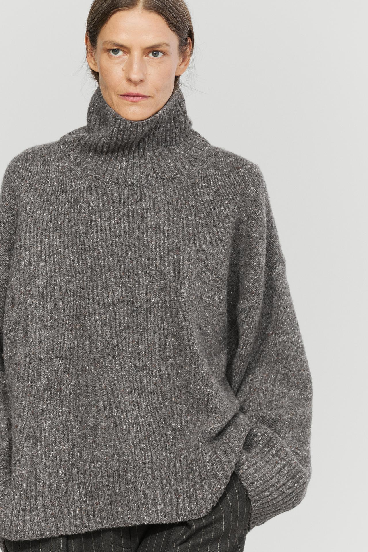 Wool-blend knit turtleneck sweater — 210