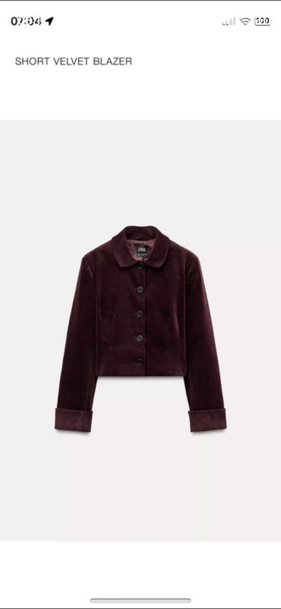 Burgundy velvet short jacket with black buttons, white background. Text in the image: "SHORT VELVET BLAZER".