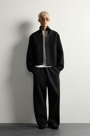 PANTALÓN RELAXED FIT PLIEGUES - Negro de Zara - Imagen 0