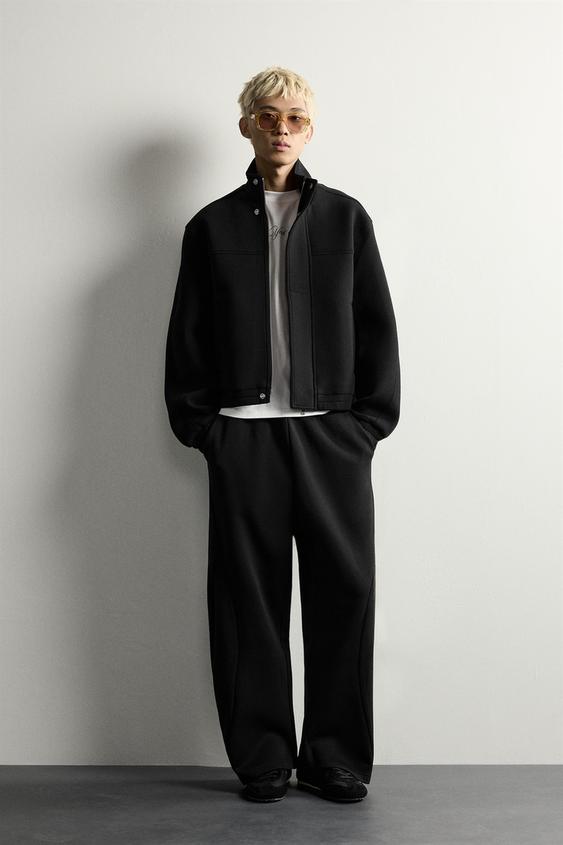 PANTALÓN RELAXED FIT PLIEGUES - Negro de Zara - Imagen 0