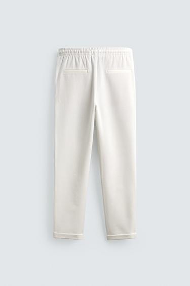 PANTALON STYLE JOGGING À TAILLE EASY CARE - Blanc cassé de Zara - Image 7