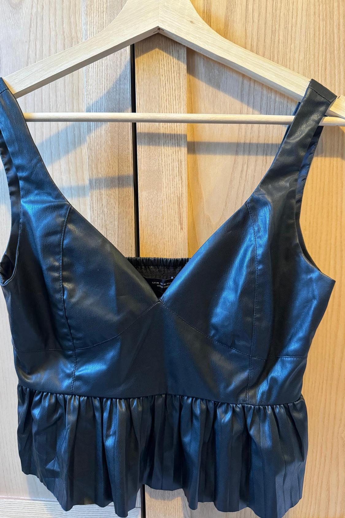 FAUX LEATHER PEPLUM TOP