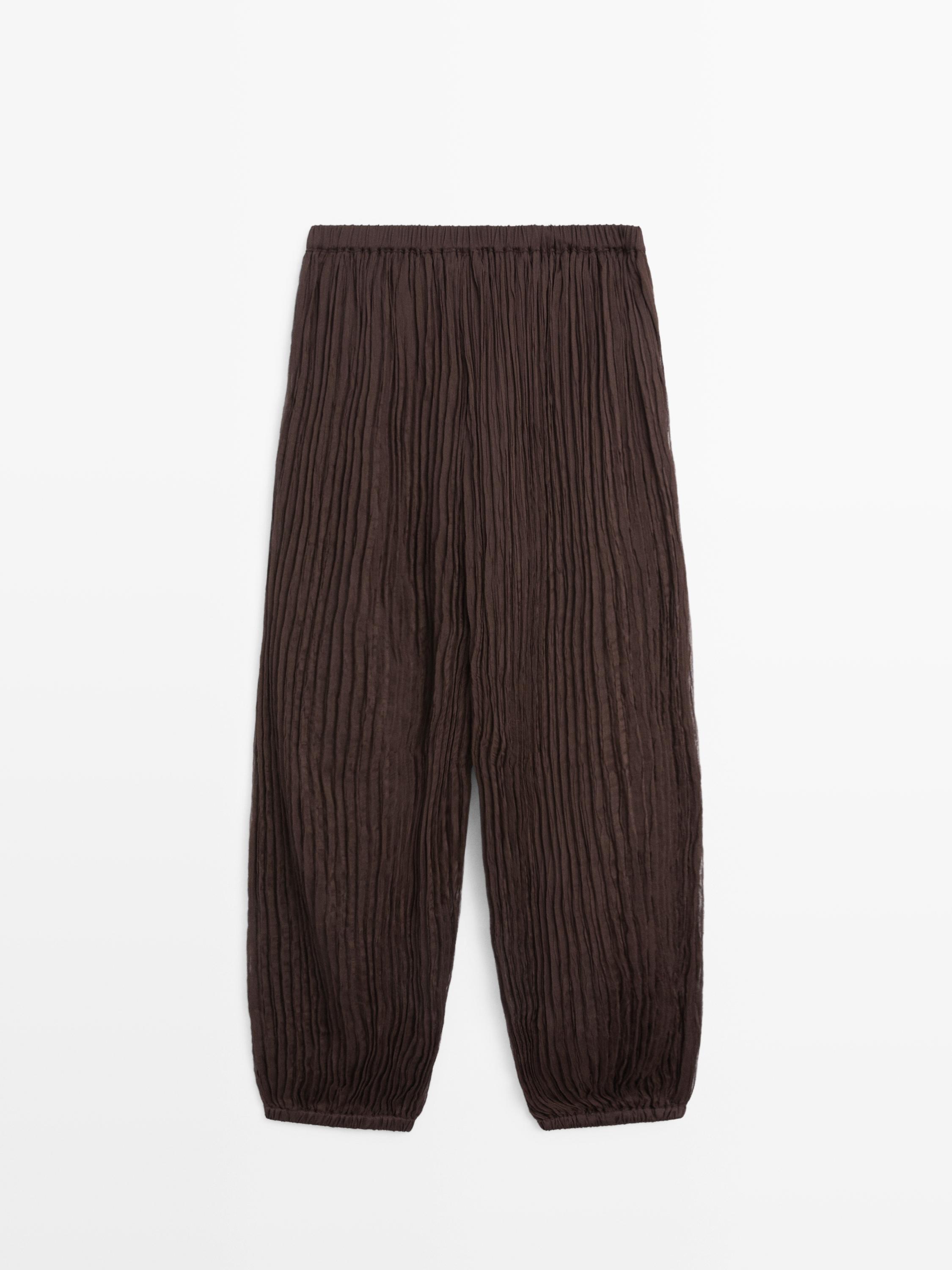 Sarouel trousers with pleated detail