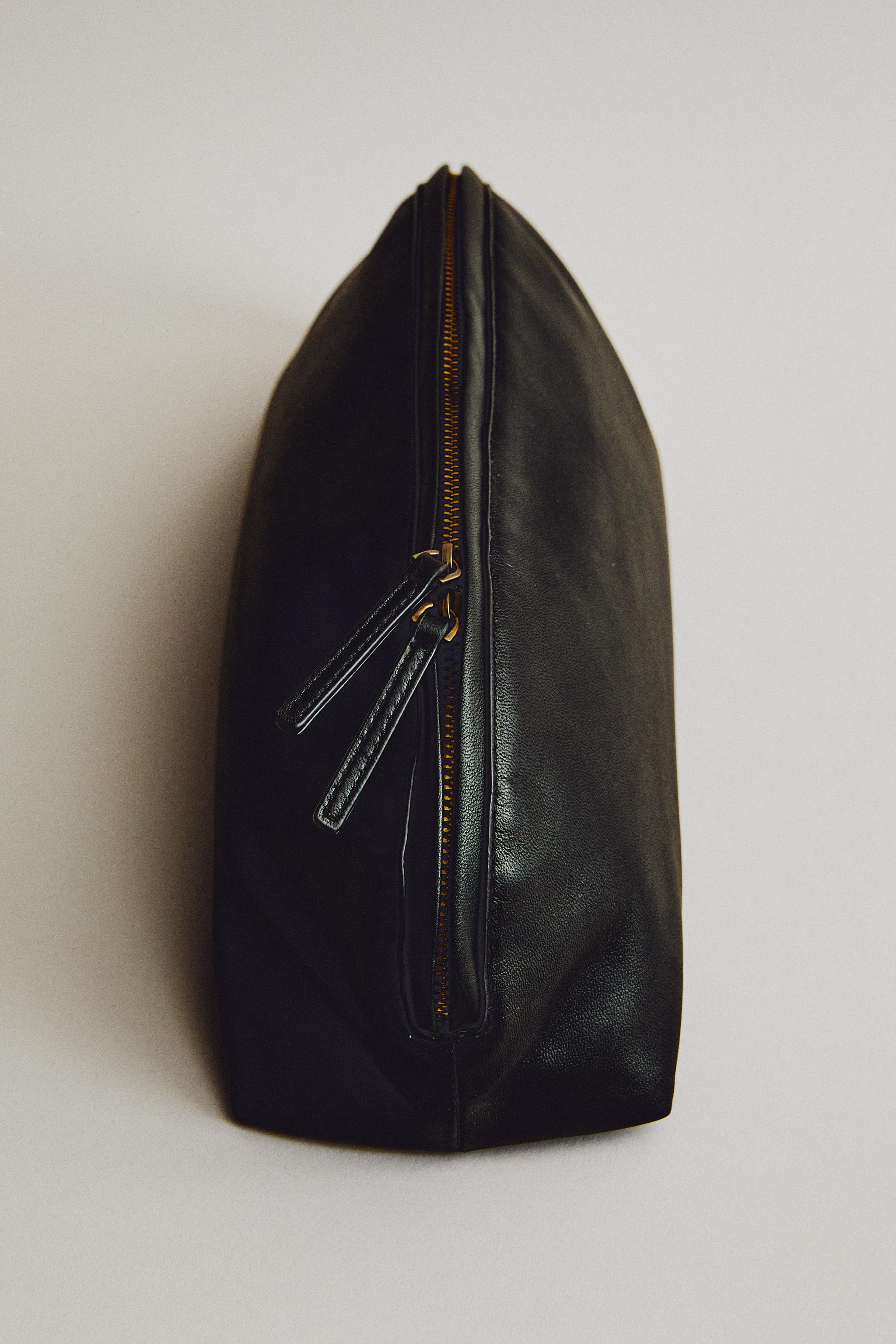 LARGE LEATHER HALF-MOON MAKEUP BAG — Burgundy Red