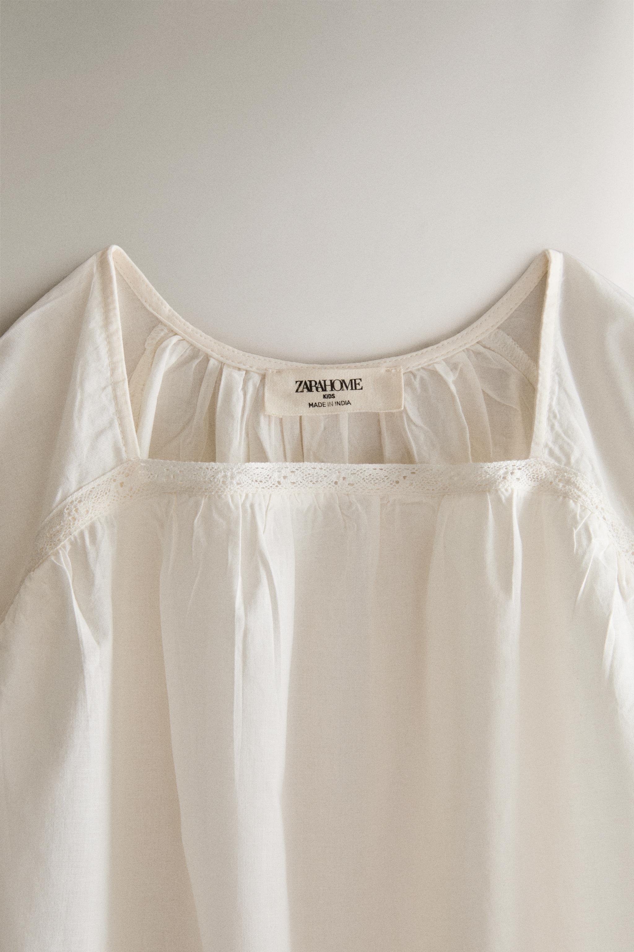 CHILDREN'S DRESS WITH LACE TRIM — Cream