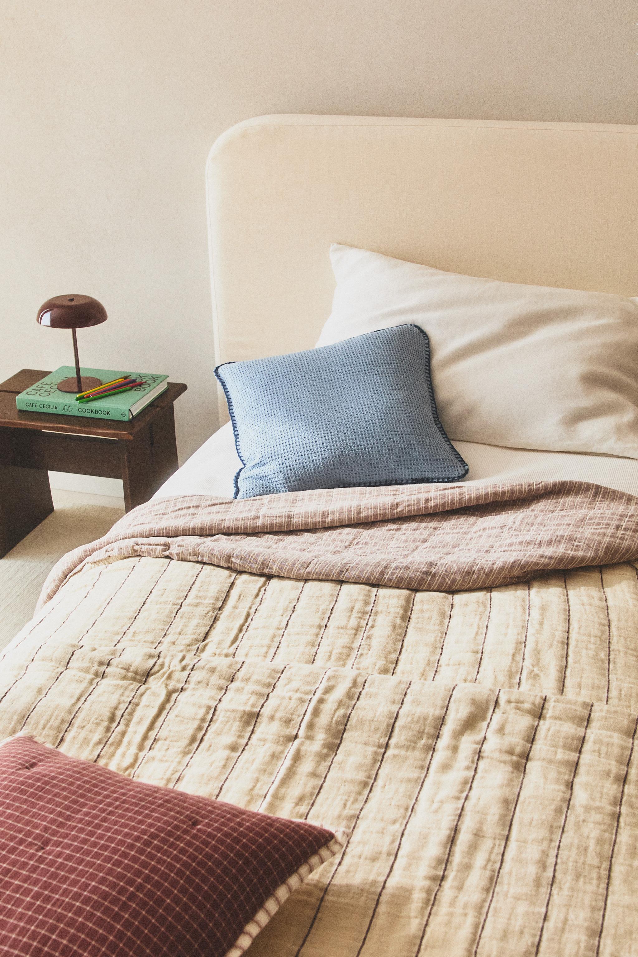 KIDS' REVERSIBLE CHECK AND STRIPE BEDSPREAD — Ecru