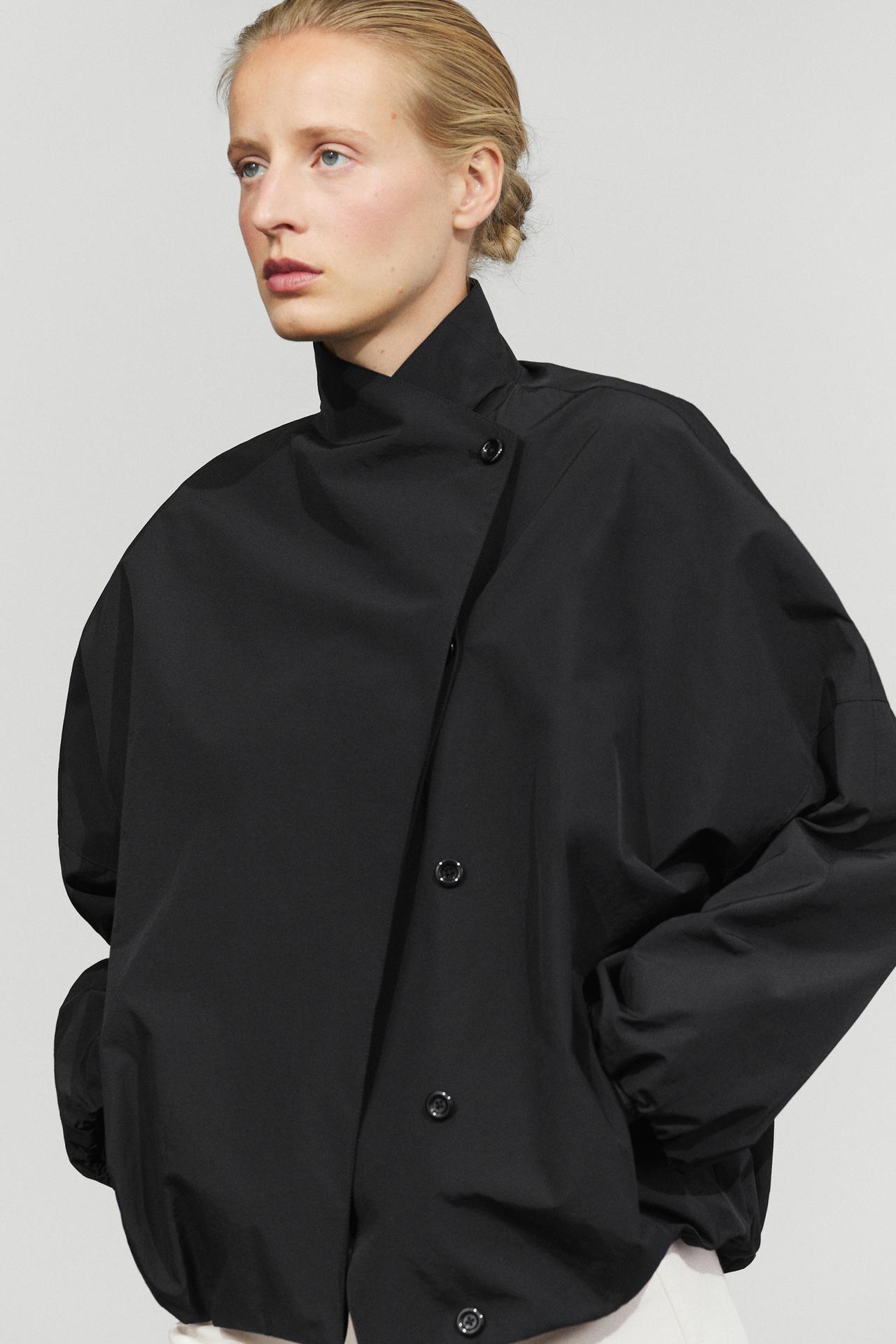 Technical bomber jacket with side button — Black