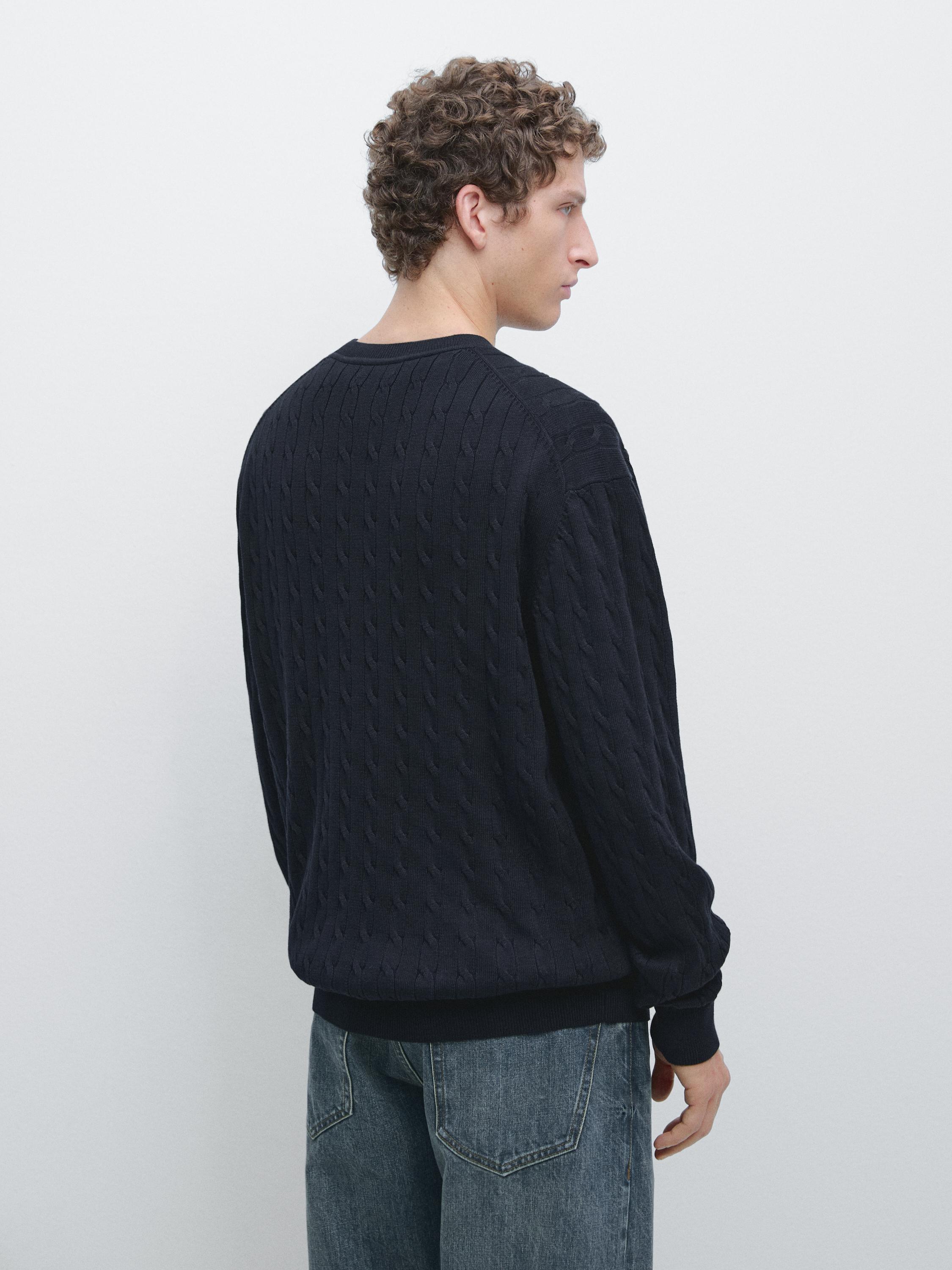 100% cotton cable-knit sweater
