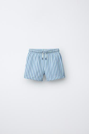 6-14 ЛЕТ/ПЛАВКИ-БЕРМУДЫ ИЗ СИРСАКЕРА В ПОЛОСКУ — СИНИЙ от Zara — изображение 0