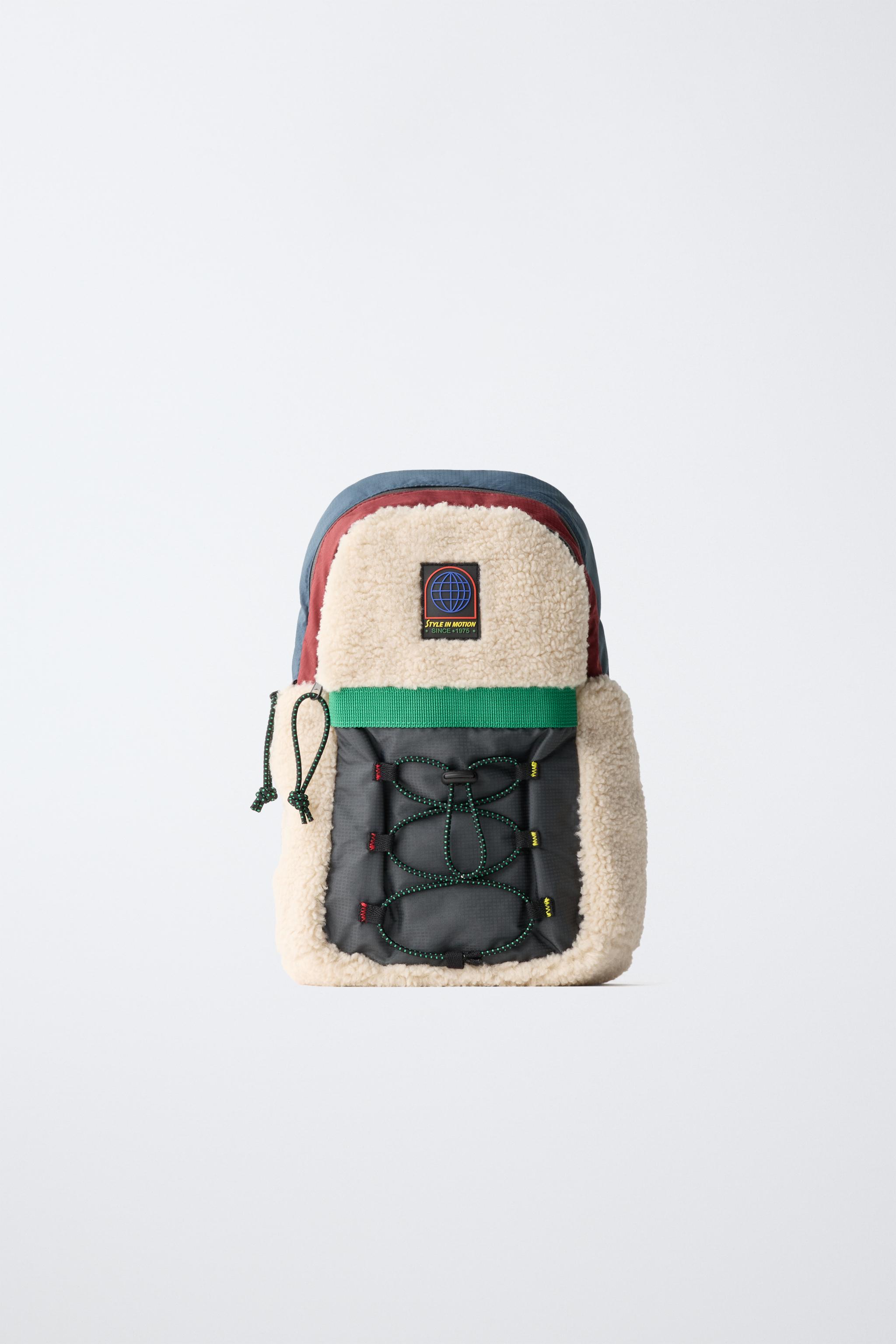 TECHNICAL FAUX SHEARLING CROSSBODY BAG