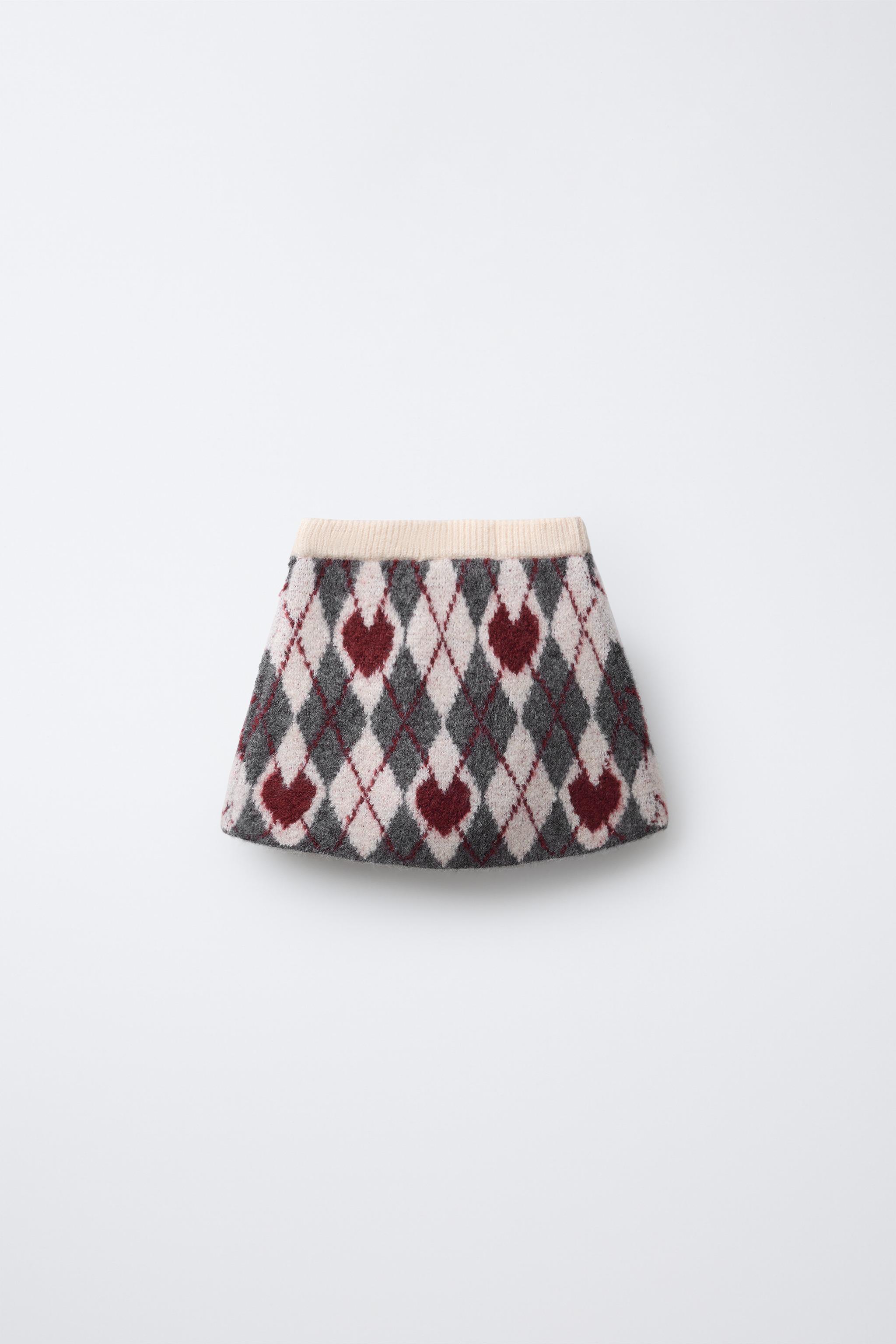 JUPE EN MAILLE À LOSANGES ET CŒURS