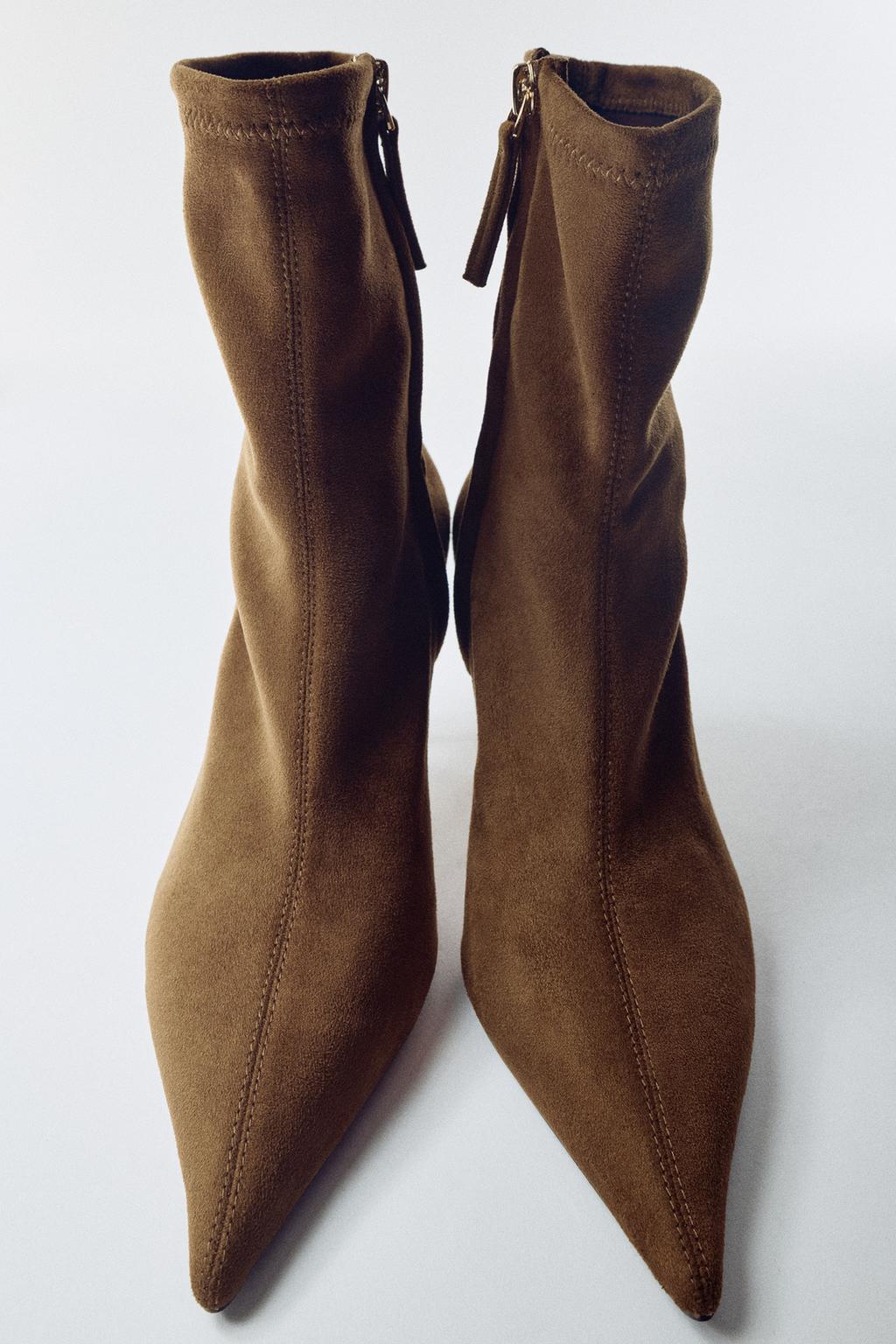 HEELED ANKLE BOOT WITH METAL DETAIL